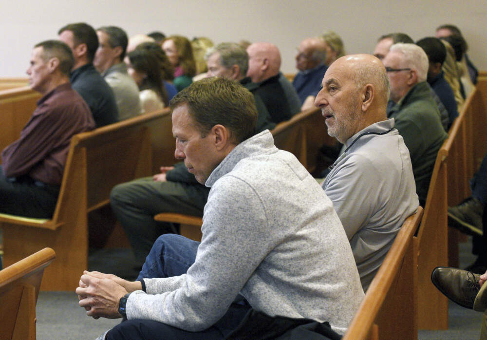 About 50 supporters of Stephen Murphy, including Stan Spirou, former SNHU basketball coach, (foreground at right) attend the first day of Murphy's trial at Hillsborough County Superior Court in Manchester, N.H., on Wednesday, Jan. 15. (David Lane/Union Leader, pool via AP)