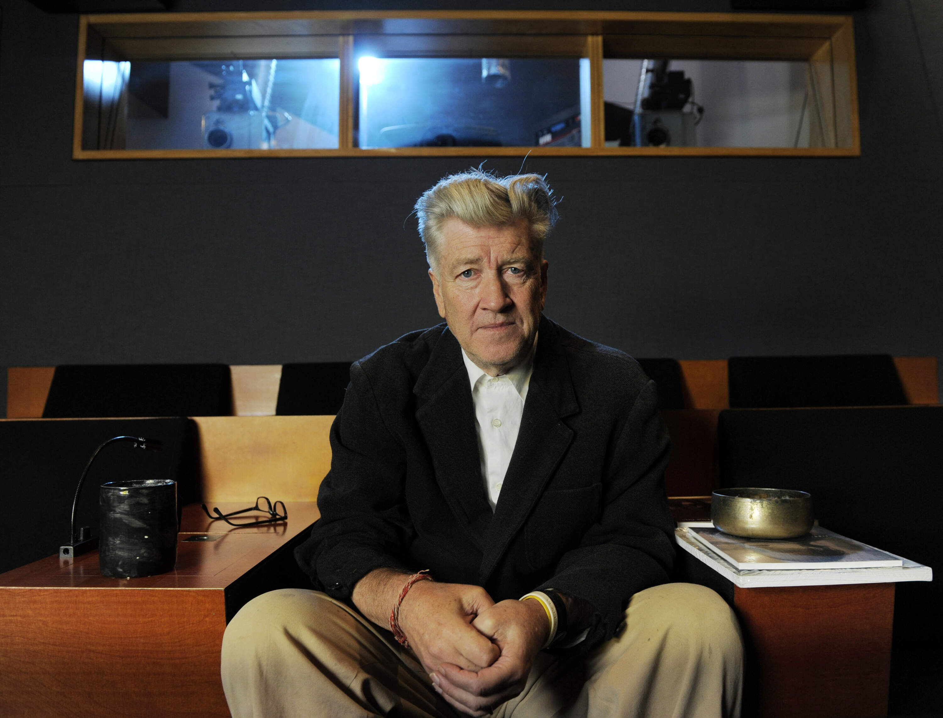 Filmmaker David Lynch poses for a portrait in his private screening room in Los Angeles. (Chris Pizzello/AP)