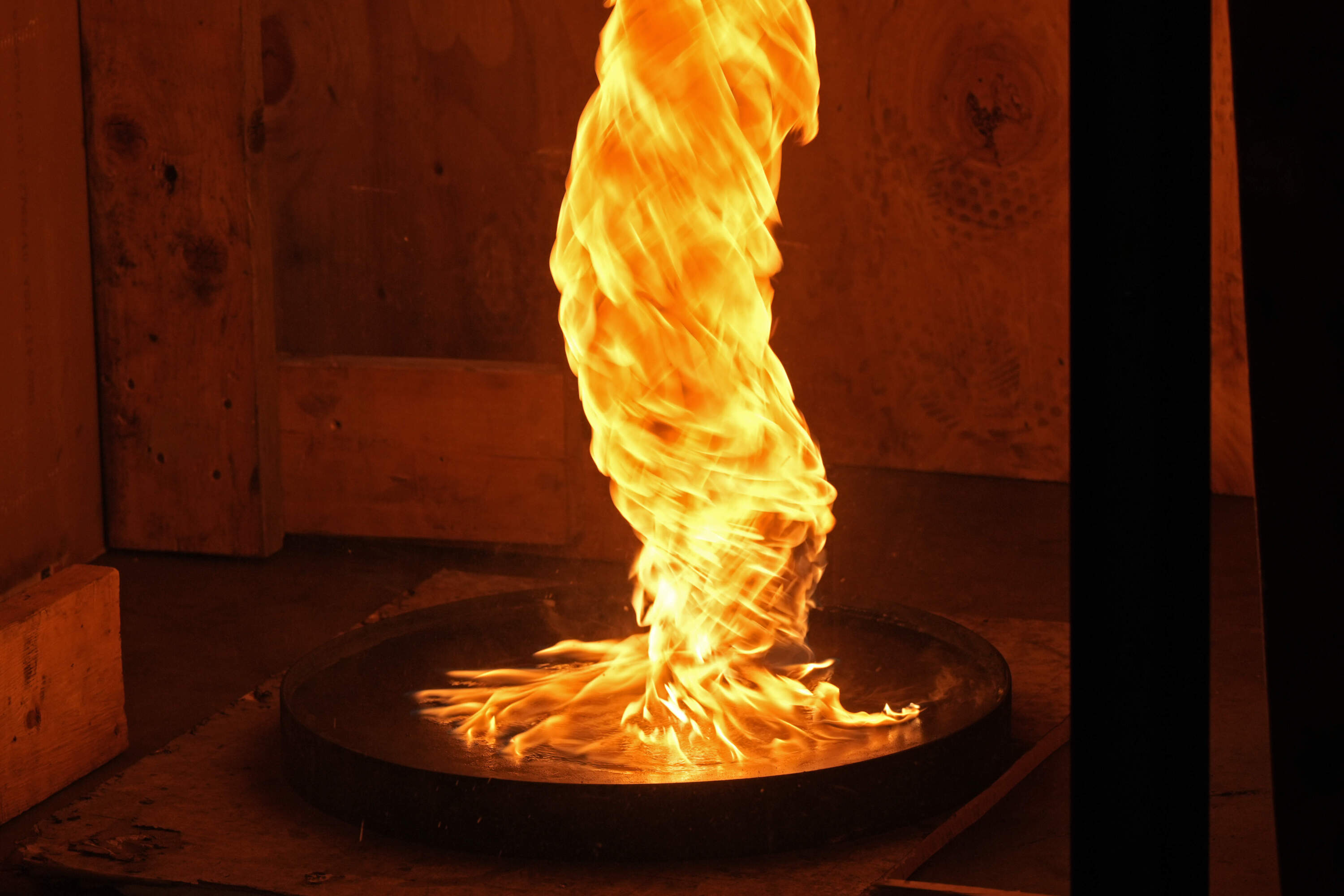 A controlled fire whirl burns during a test in the department of Fire Protection Engineering at Worcester Polytechnic Institute Wednesday, Jan. 15, 2025, in Worcester, Mass. (Robert F. Bukaty/AP)
