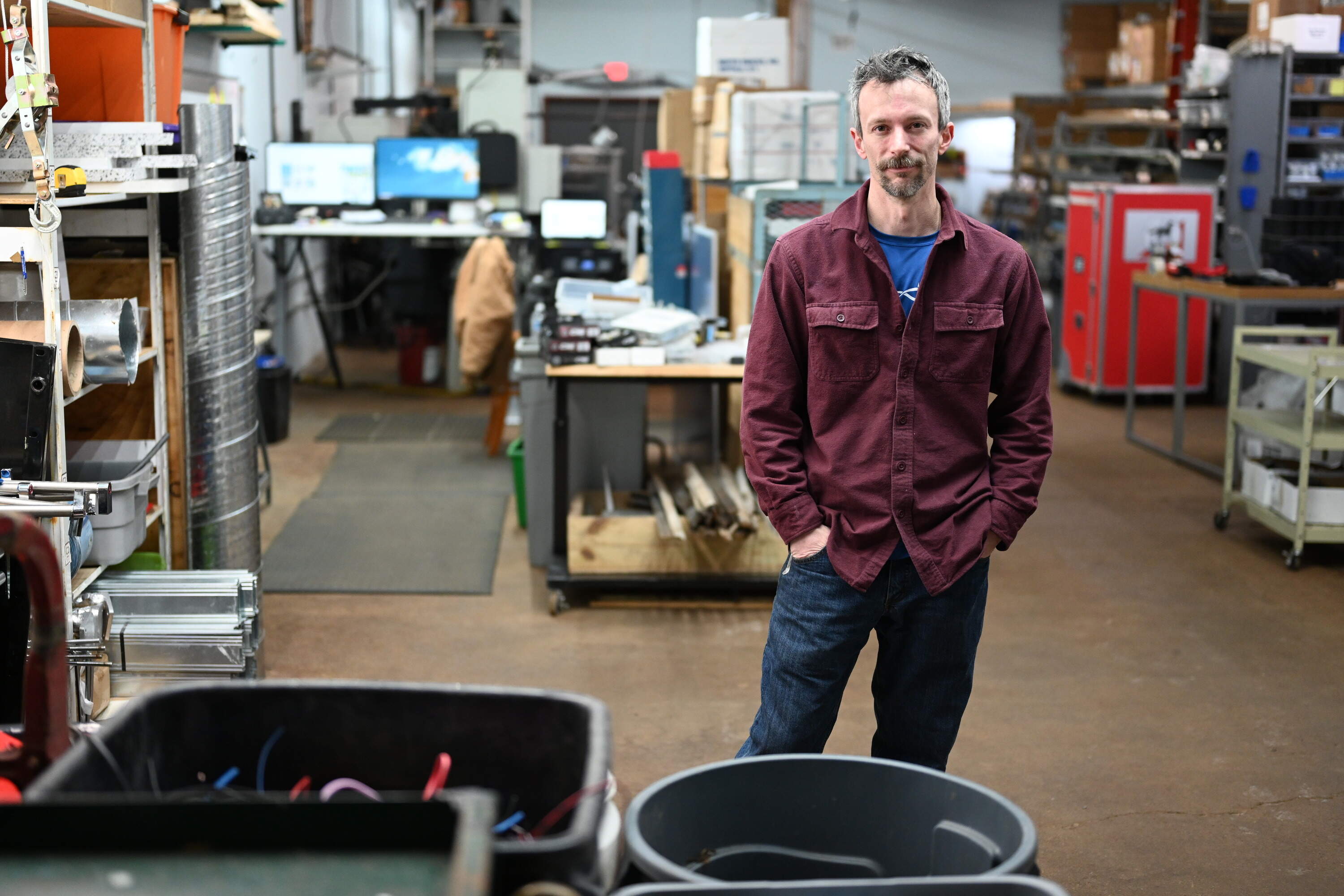The Sheffields have a workshop in south Buffalo with a CNC milling machine and 3D printer. Dave Sheffield uses the machines for his business, Buffalo Bottle Craft. (Chris Bentley/Here &amp; Now)
