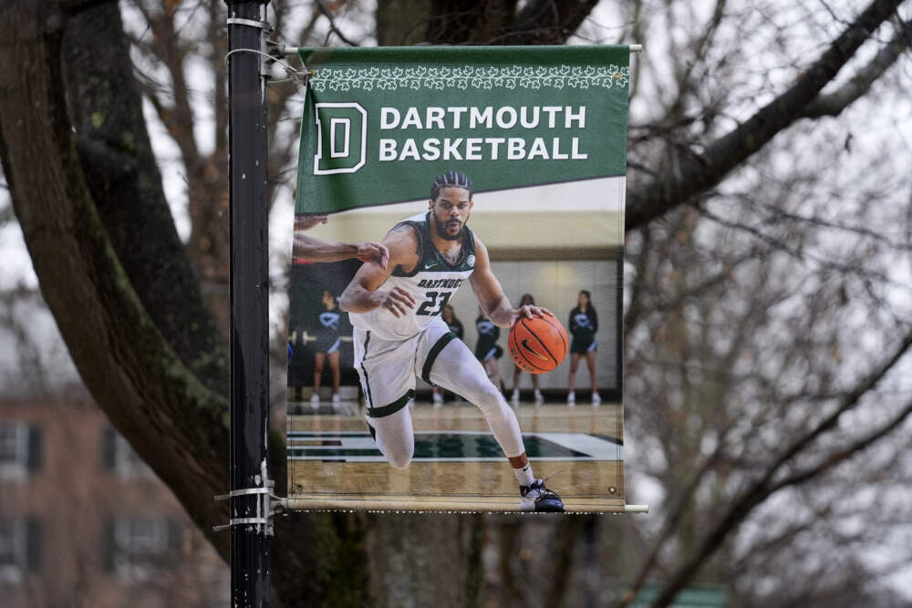 A poster of a basketball player is attached to a lamppost on the campus of Dartmouth College, March 5, 2024, in Hanover, N.H. (Robert F. Bukaty/AP)