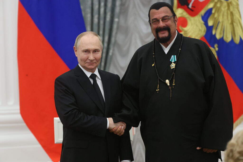 MOSCOW, RUSSIA - MAY 30: (RUSSIA OUT) Russian President Vladimir Putin (L) greets American actor, martial artist and Special Representative of Russian Foreign Minisrty on Cultural connections Steven Seagal (R), just awarded with the Order of Friendship, during an awarding ceremony at the Kremlin, on May 30, 2024 in Moscow, Russia. President Putin gave awards to many people, including participants of the military invsion of Ukriane, cosmonauts, artists and politicians. (Photo by Contributor/Getty Images)
