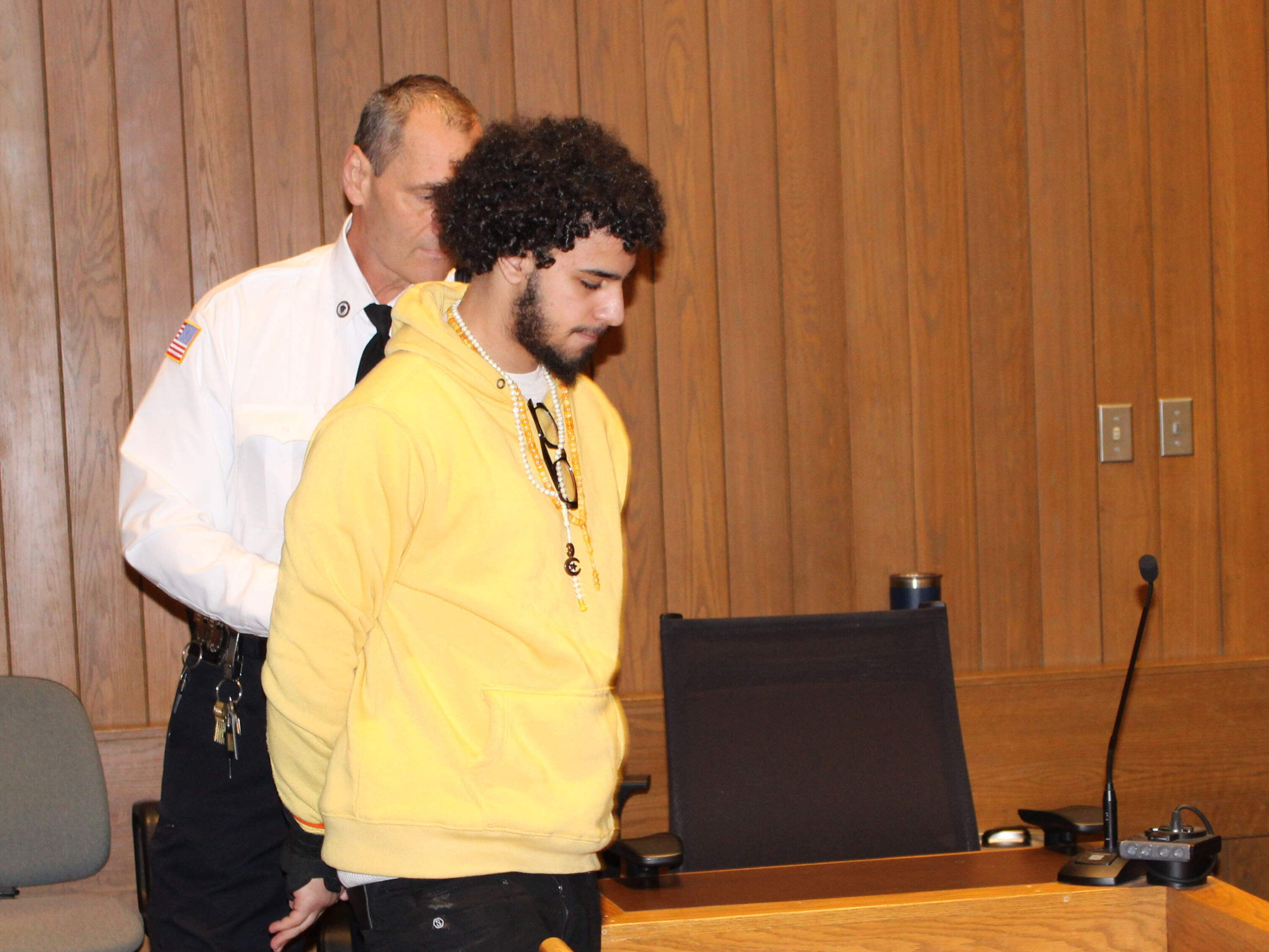Ali Ghaffar walks into a hearing at the Hampden County Superior Courthouse. Ghaffar was sentenced to 22 years on multiple rape charges. (Todd Wallack/WBUR)
