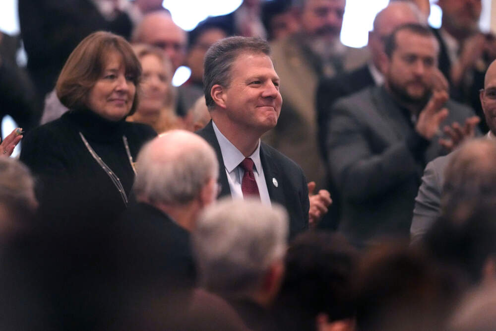 Former N.H. Gov. Chris Sununu is recognized by Republican Kelly Ayotte during her inauguration. (Charles Krupa/AP)