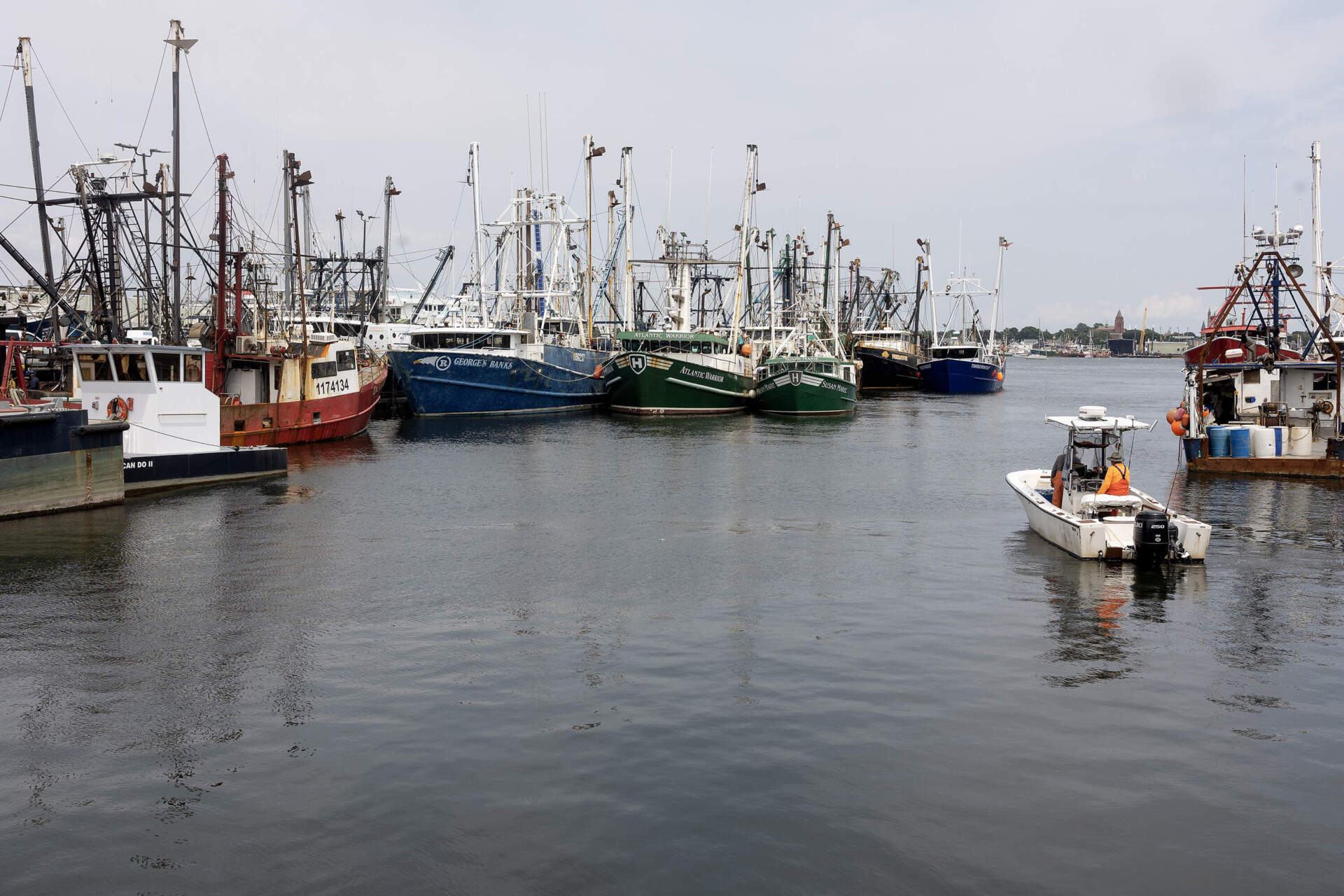 Views of commercial fishing boats in the harbor on July 22, 2024, in New Bedford, Massachusetts. New Bedford remains one of the last New England ports with a working fishing industry. (Andrew Lichtenstein/Corbis via Getty Images)