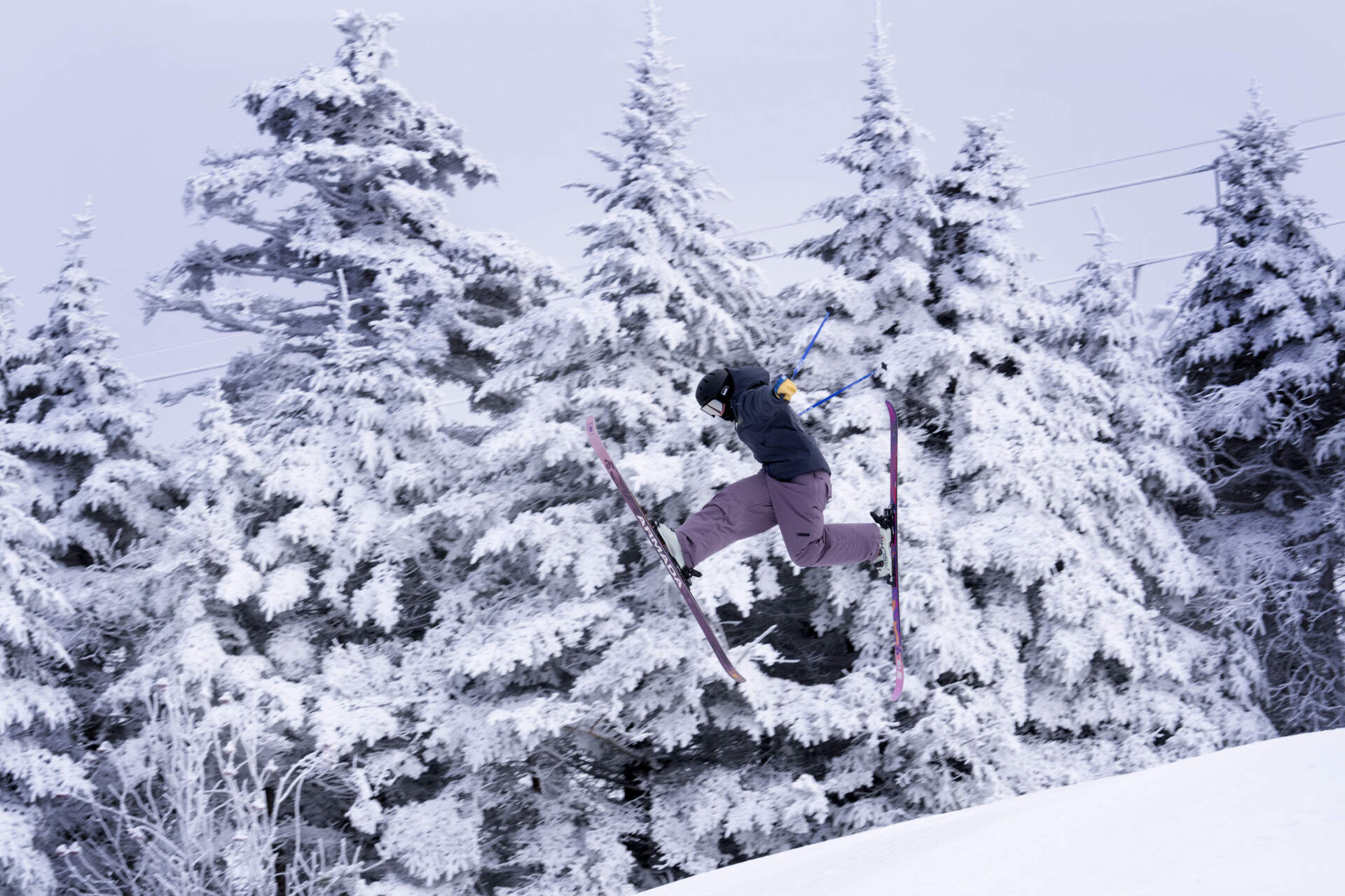 A skier performs a trick while going down Killington Mountain in Killington, Vermont. (Robert F. Bukaty/AP)