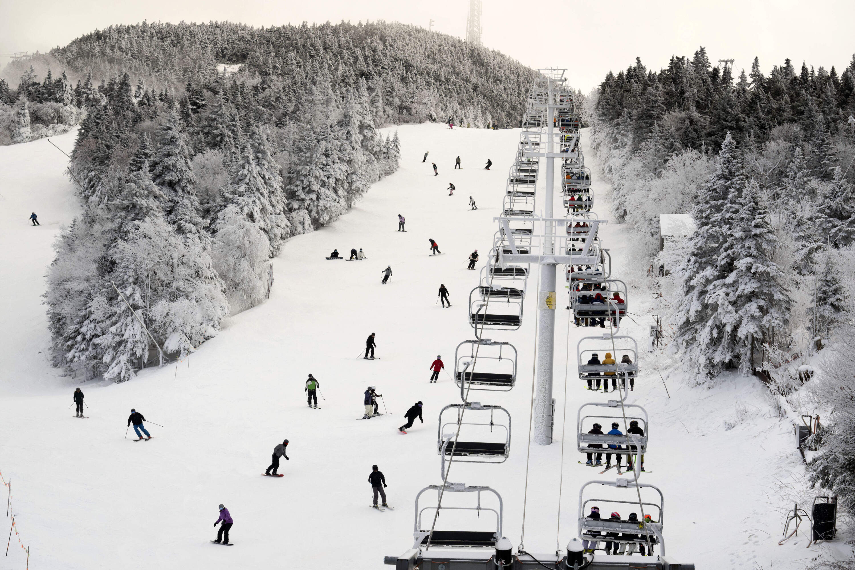 Skiers descend near the North Ridge Quad chairlift at Killington Ski Resort in Vermont. (Robert F. Bukaty/AP)