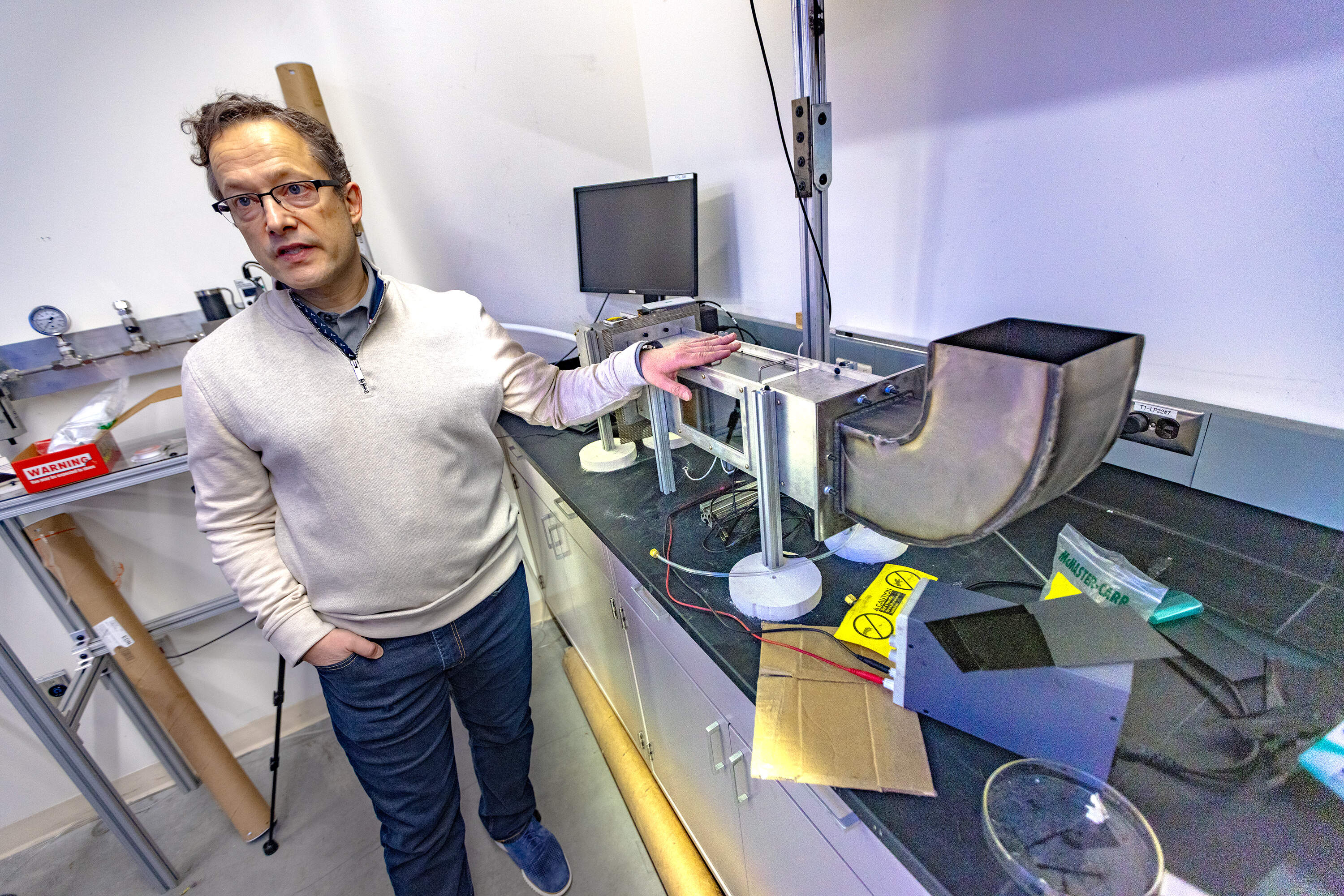 Albert Simeoni, professor and department head of the Fire Protection Engineering Department at WPI, talks about a small wind tunnel in one of the labs. (Jesse Costa/WBUR)