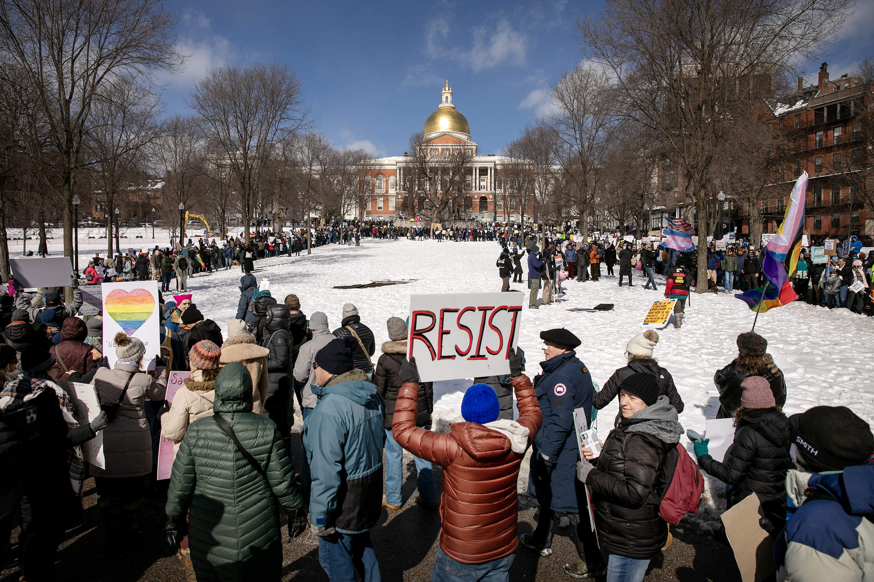 Protesters at the "No Kings on Presidents' Day" rally and march, fill the walkways on Boston Common in front of the State House. (Robin Lubbock/WBUR)