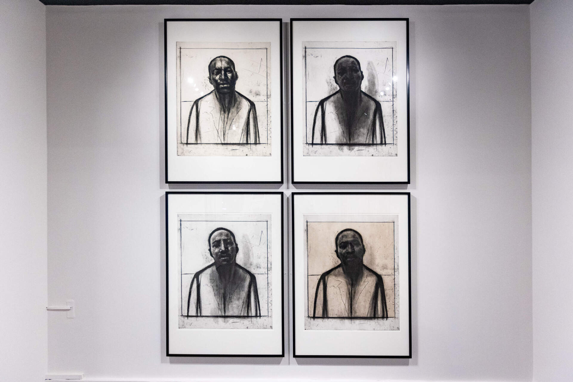 Four etchings of Martin Luther King Jr. at the “Witnessing Humanity: The Art of John Wilson” exhibit at the Museum of Fine Arts, Boston. (Jesse Costa/WBUR)