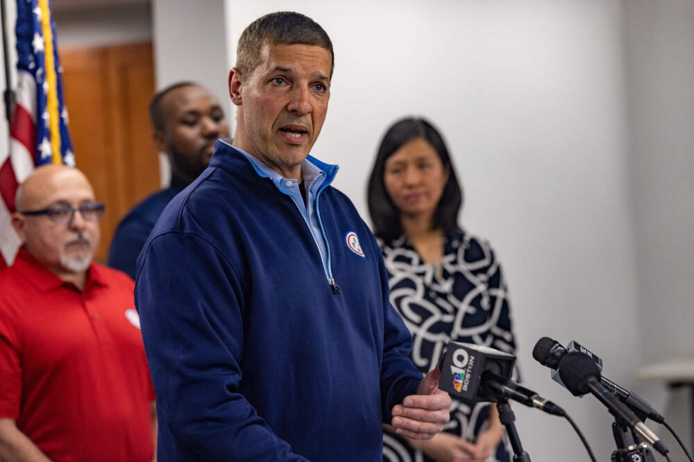 Boston Police Patrolman’s Association President Lawrence Calderone officially endorses Mayor Michelle Wu for reelection this year. (Jesse Costa/WBUR)