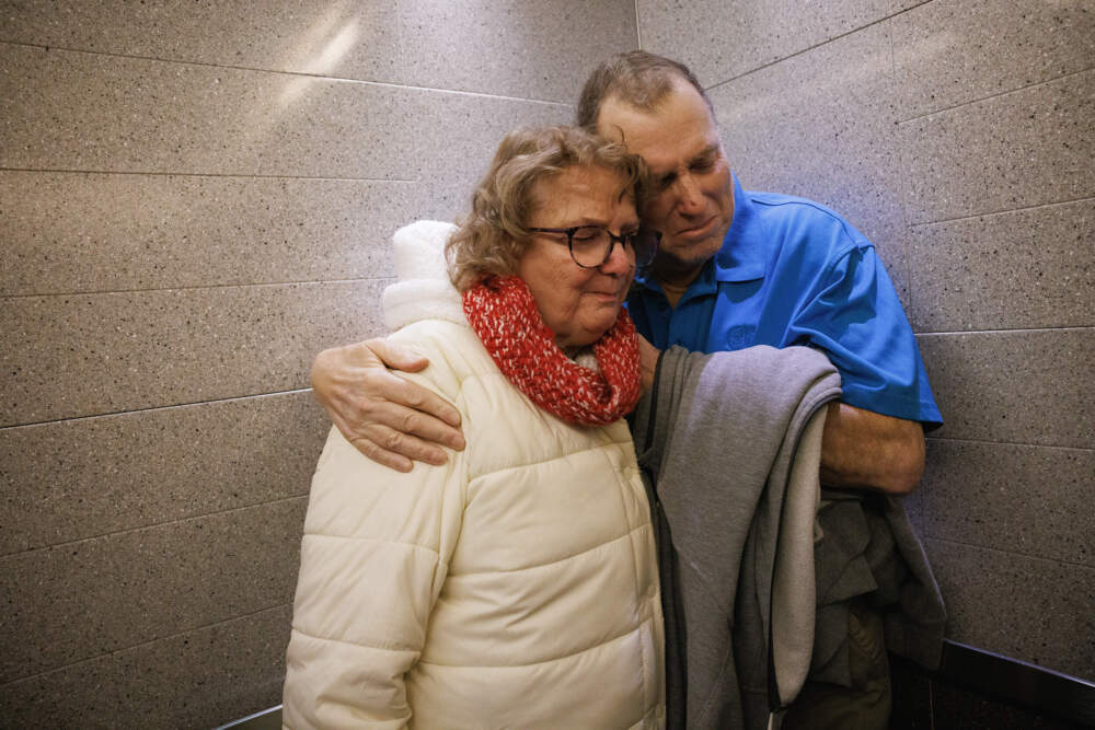 Tim Andrews and his wife, Karen, share an embrace while leaving Massachusetts General Hospital on Saturday, Feb. 1, 2025. (Courtesy of Kate Flock/Massachusetts General Hospital)