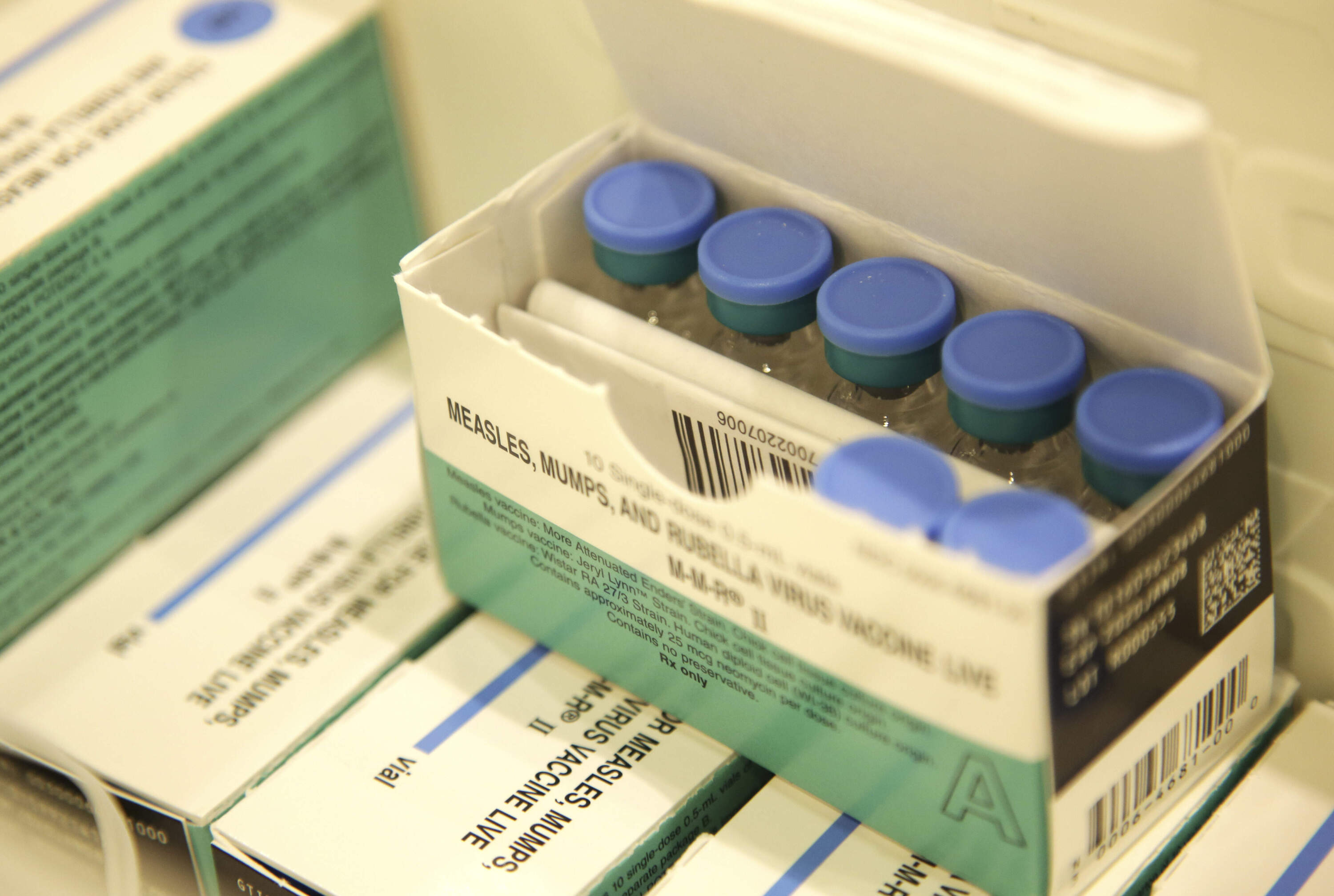 Measles, mumps and rubella vaccines are seen in a cooler. (Seth Wenig/AP)