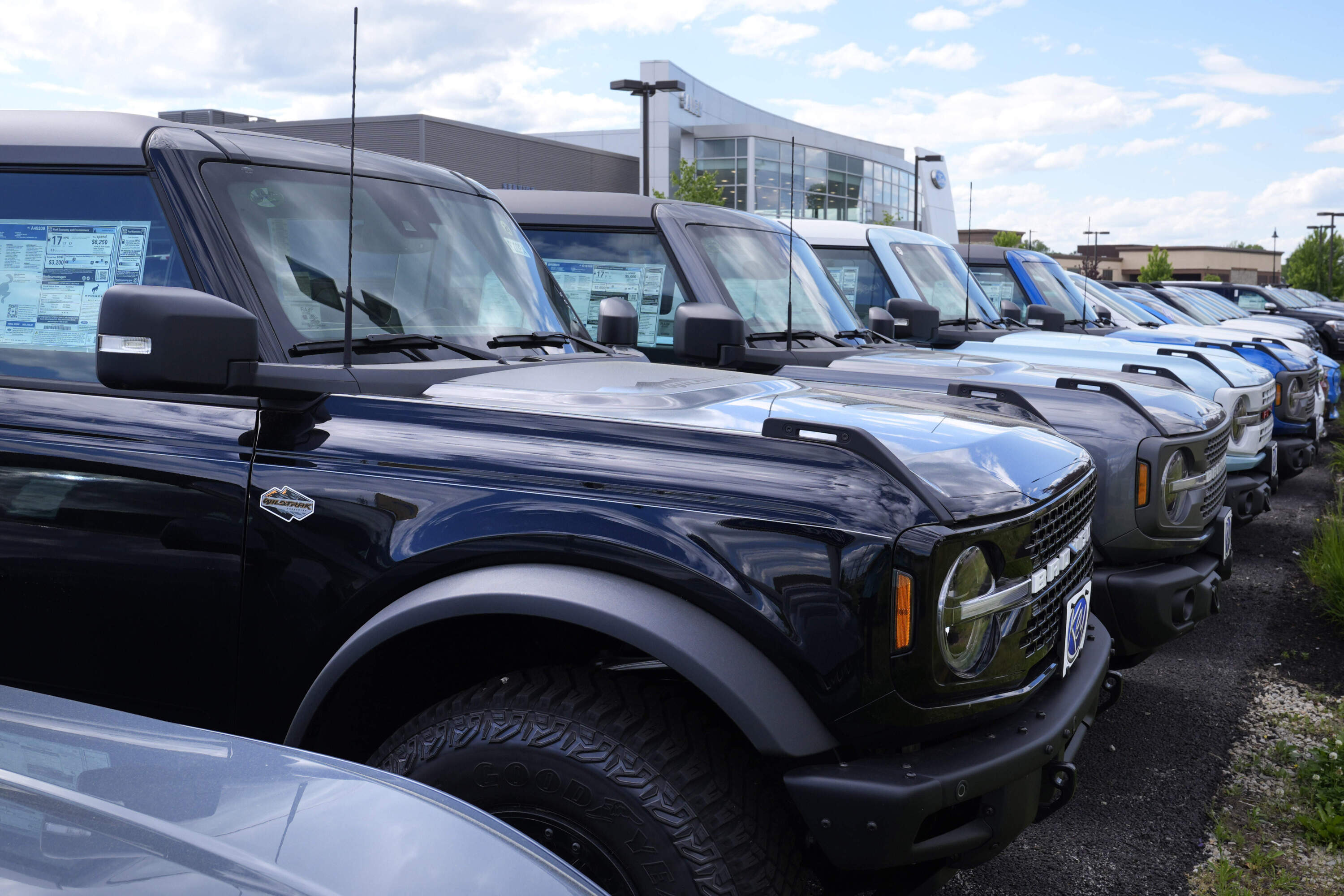A Ford Bronco SUV's are shown on a dealership lot, Wednesday, May 29, 2024, in Salem, N.H. (Charles Krupa/AP)