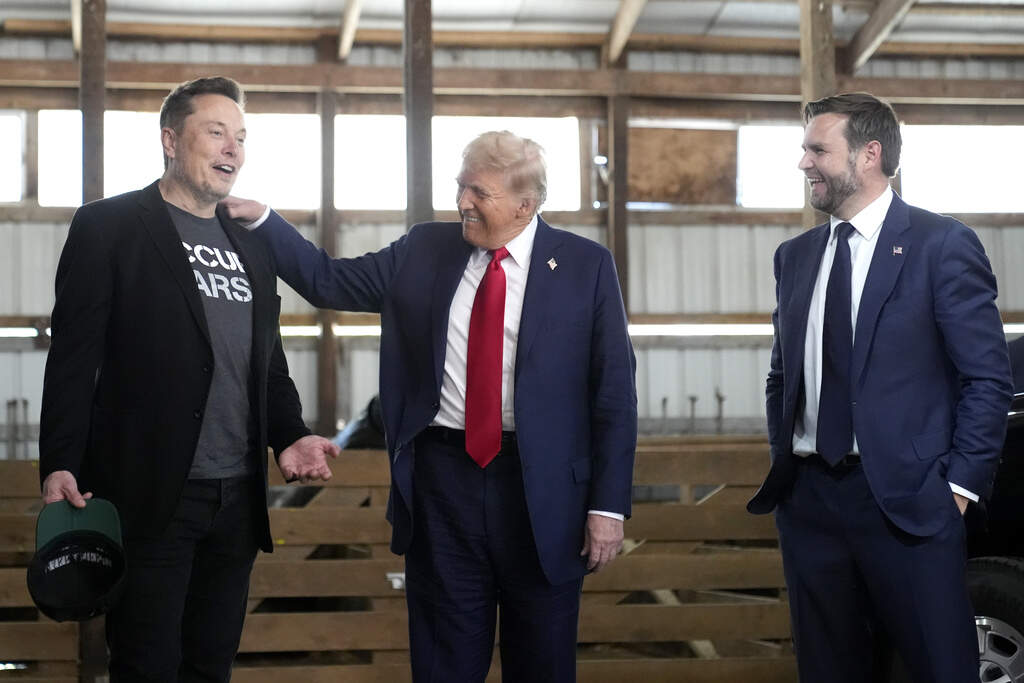 Tesla and SpaceX CEO Elon Musk, then-candidates President Donald Trump and Vice President JD Vance at a campaign event at the Butler Farm Show, in in Butler, Penn., Oct. 5, 2024. (Alex Brandon/AP)