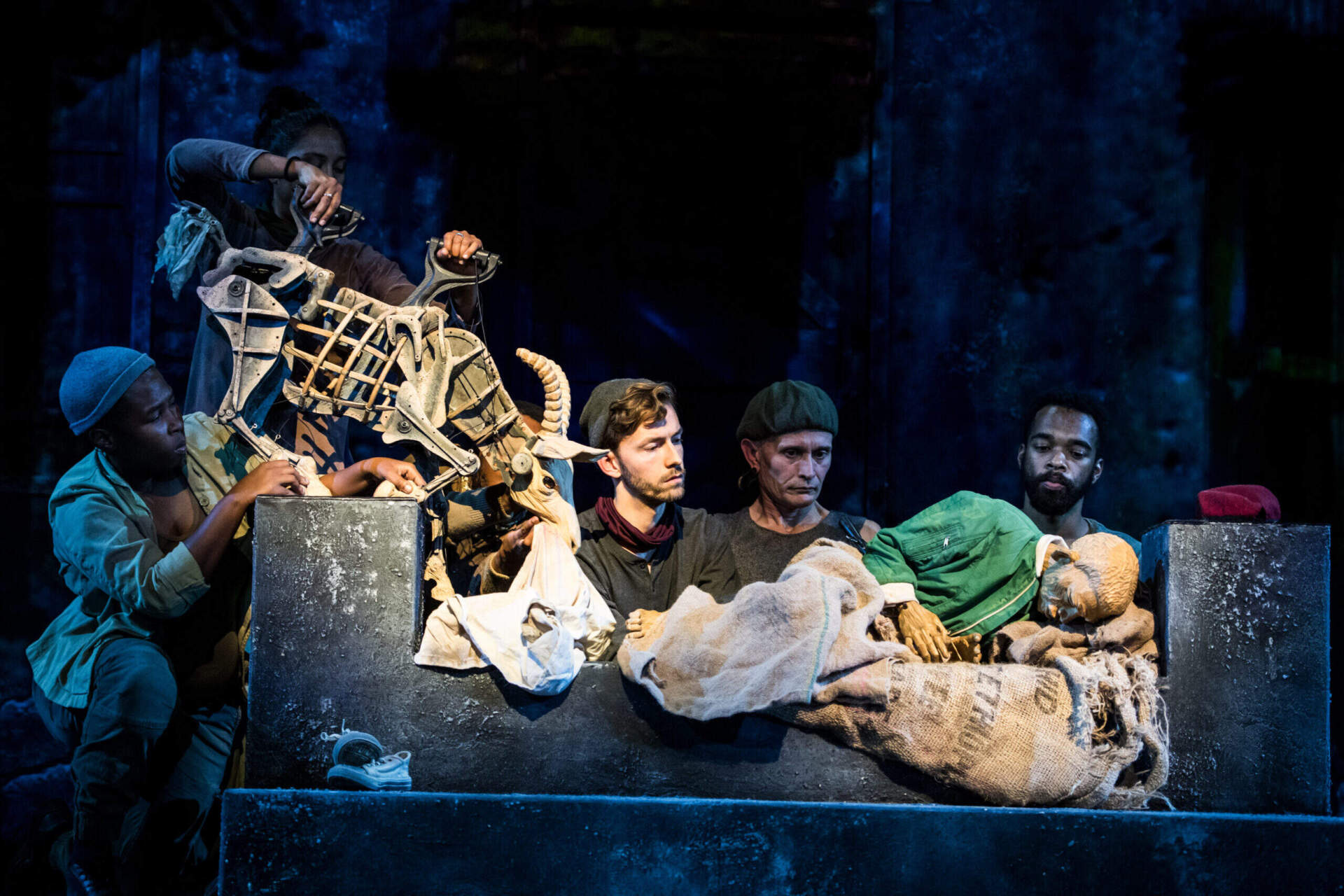 Actors onstage during a production of "Life & Times of Michael K." (Courtesy Baxter Theatre and Düsseldorfer Schauspielhaus)