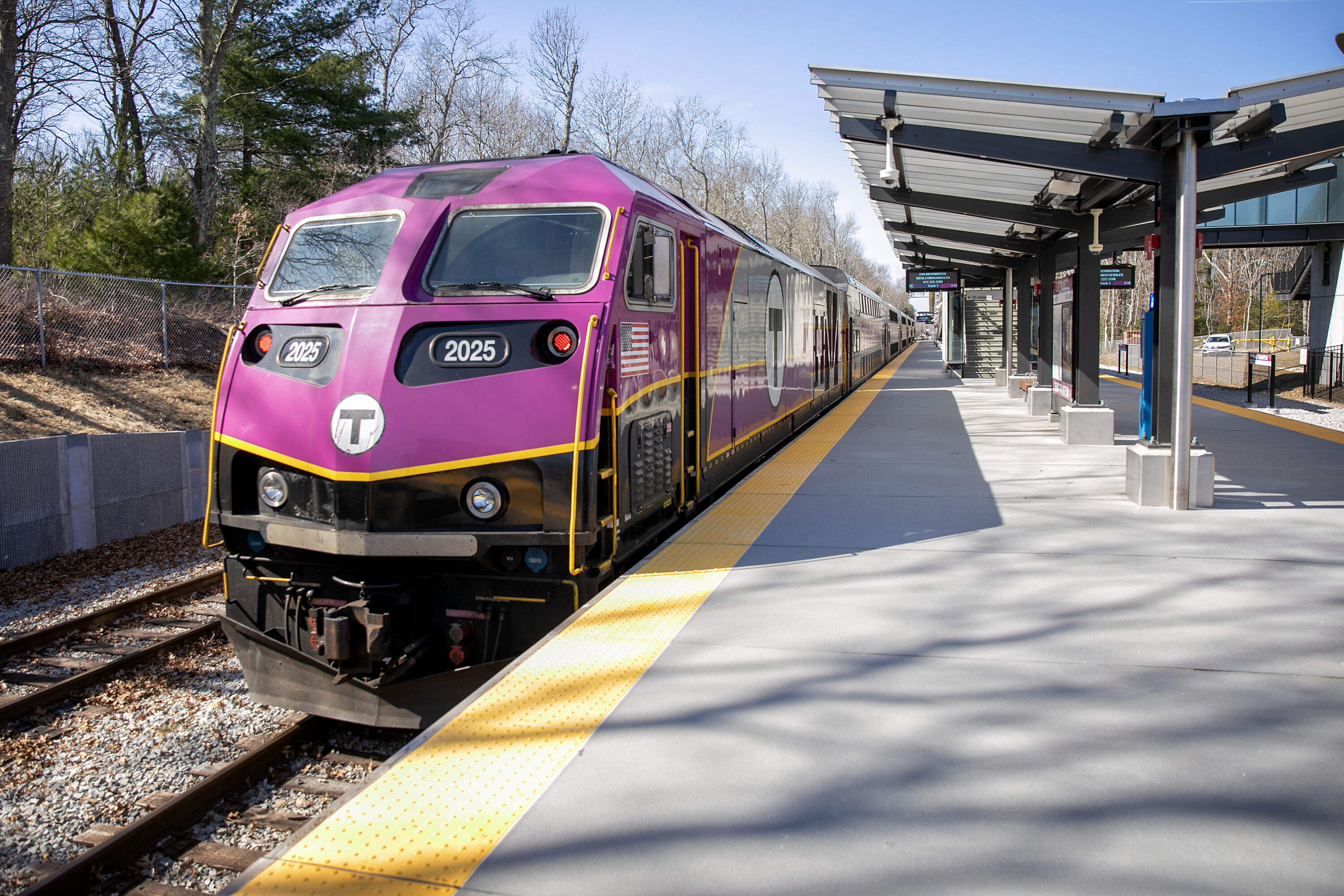 An MBTA commuter rail train pulls out of East Taunton station. (Robin Lubbock/WBUR)