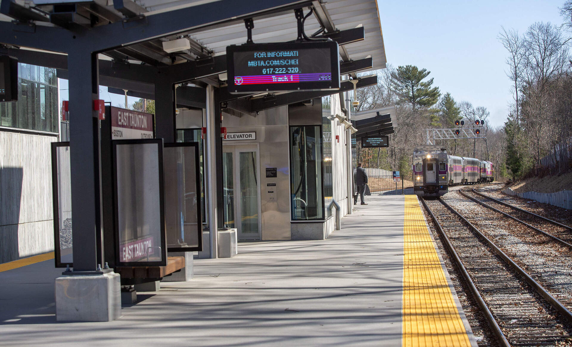 An MBTA commuter rail train pulls into East Taunton station. (Robin Lubbock/WBUR)