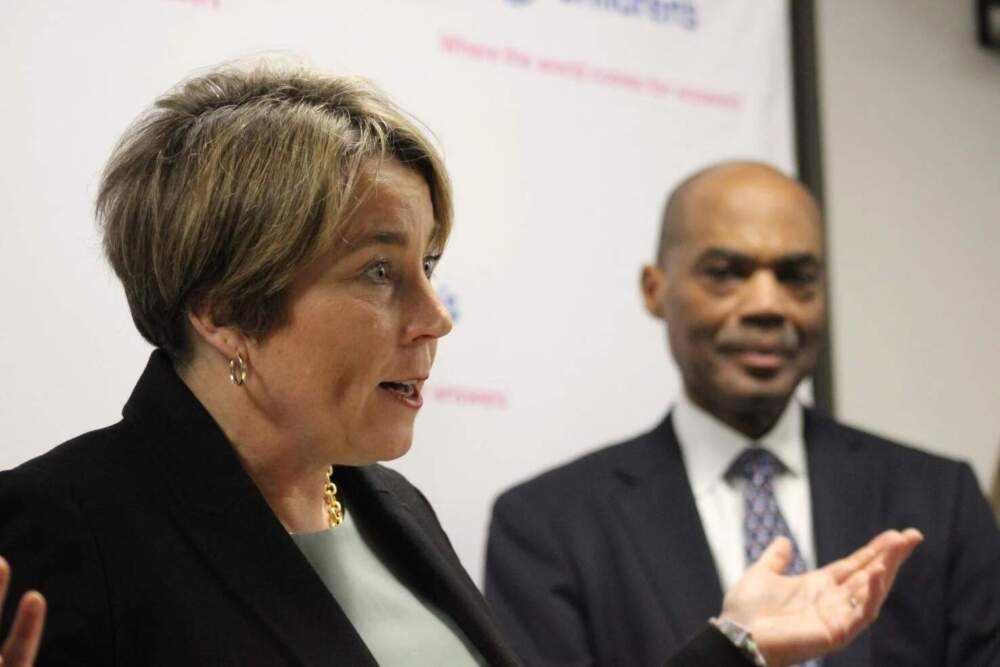 Gov. Maura Healey speaks to reporters at a press conference at Boston Children's Hospital on Monday, March 17 2025. Boston Children's Hospital President and CEO Kevin Churchwell stands to her side. (Sam Drysdale / SHNS)