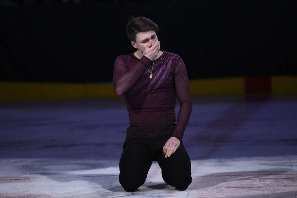 Max Naumov reacts after performing Sunday, March 2 in Washington at the Legacy on Ice event, a figure skating tribute to support the families of those who died in the D.C. plane crash. (Nick Wass/AP)
