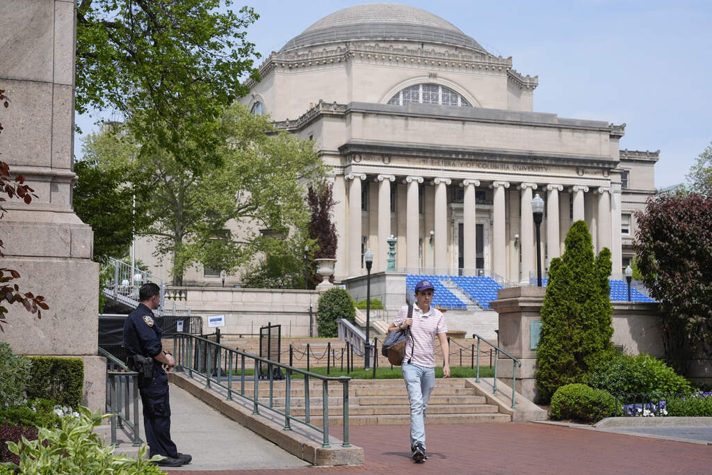 A New York City police officer keeps watch on the campus of Columbia University in New York, Monday, May 6, 2024. (Seth Wenig/AP)