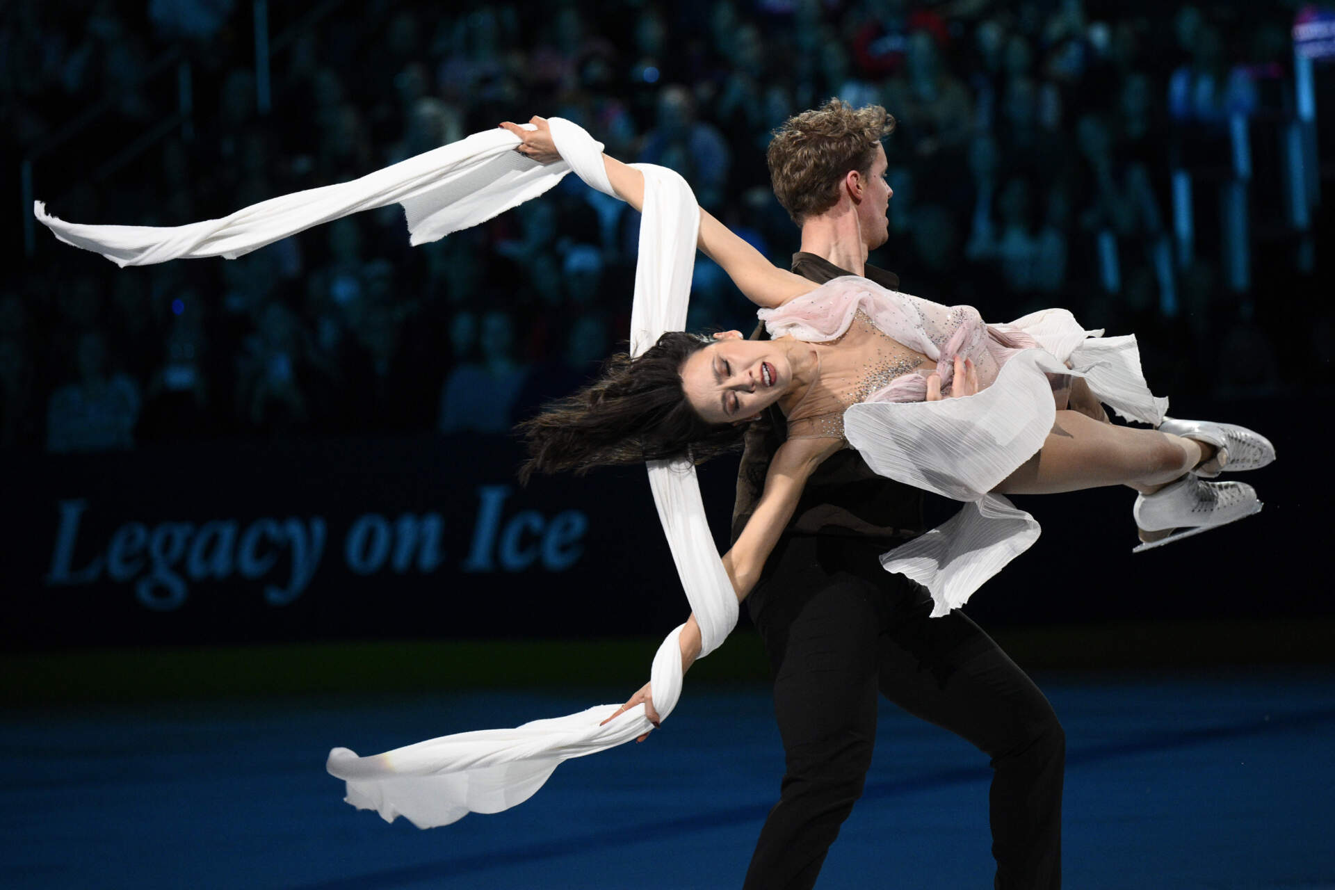 Madison Chock, front, and Evan Bates perform at the Legacy on Ice event. (Nick Wass/AP)