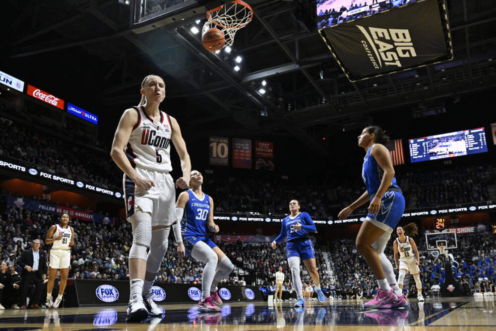 Paige Bueckers (5) reacts after making a basket while being fouled during the second half of an NCAA college basketball game against Creighton in the finals of the Big East Conference tournament. (Jessica Hill/AP)