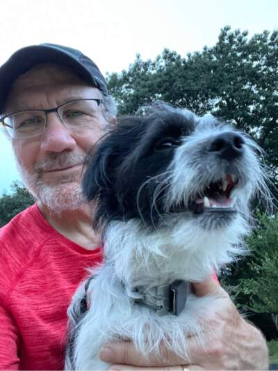 The author holding Huey, rescue dog extraordinaire. (Courtesy David Rubin)