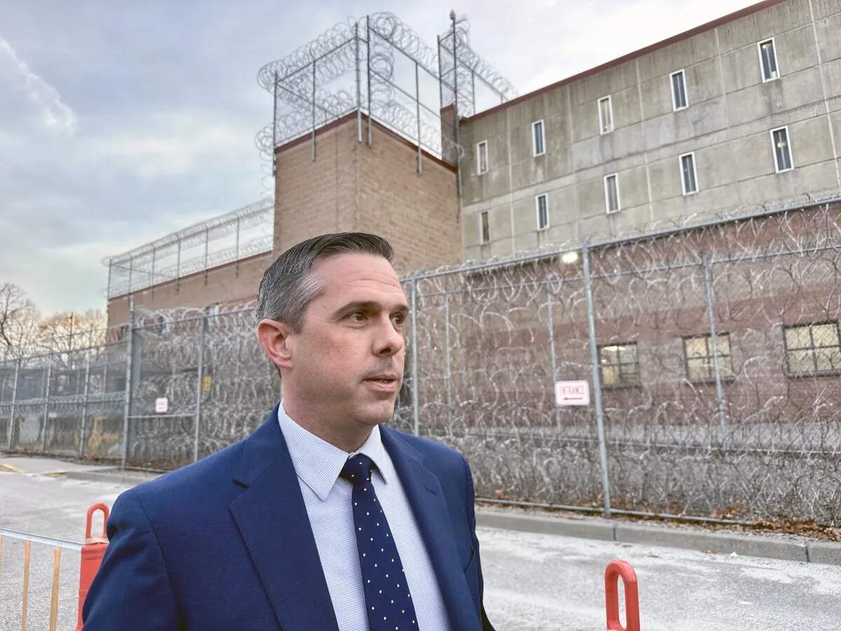 Attorney David Keller speaks to protestors in front of the Donald W. Wyatt detention facility in Central Falls, R.I., on March 18, 2025. (Olivia Ebertz/The Public's Radio)