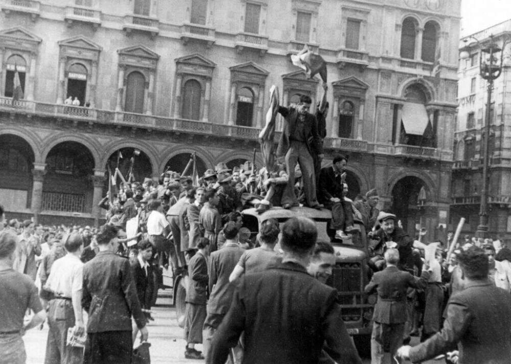 Antifascist protesters arriving on a truck in a crowded Piazza del Duomo. Milan, July 26, 1943 (Mondadori via Getty Images)