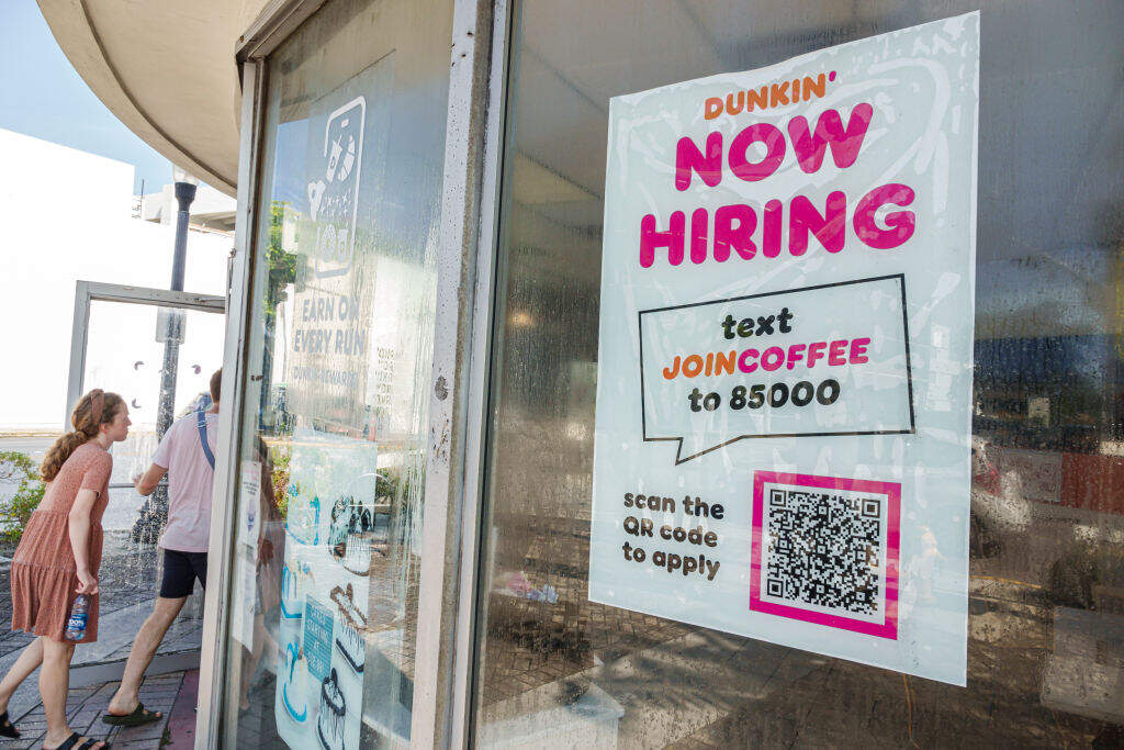 A help wanted sign with a QR code at a Dunkin' in Miami Beach, Fla. (Jeffrey Greenberg/Universal Images Group via Getty Images)