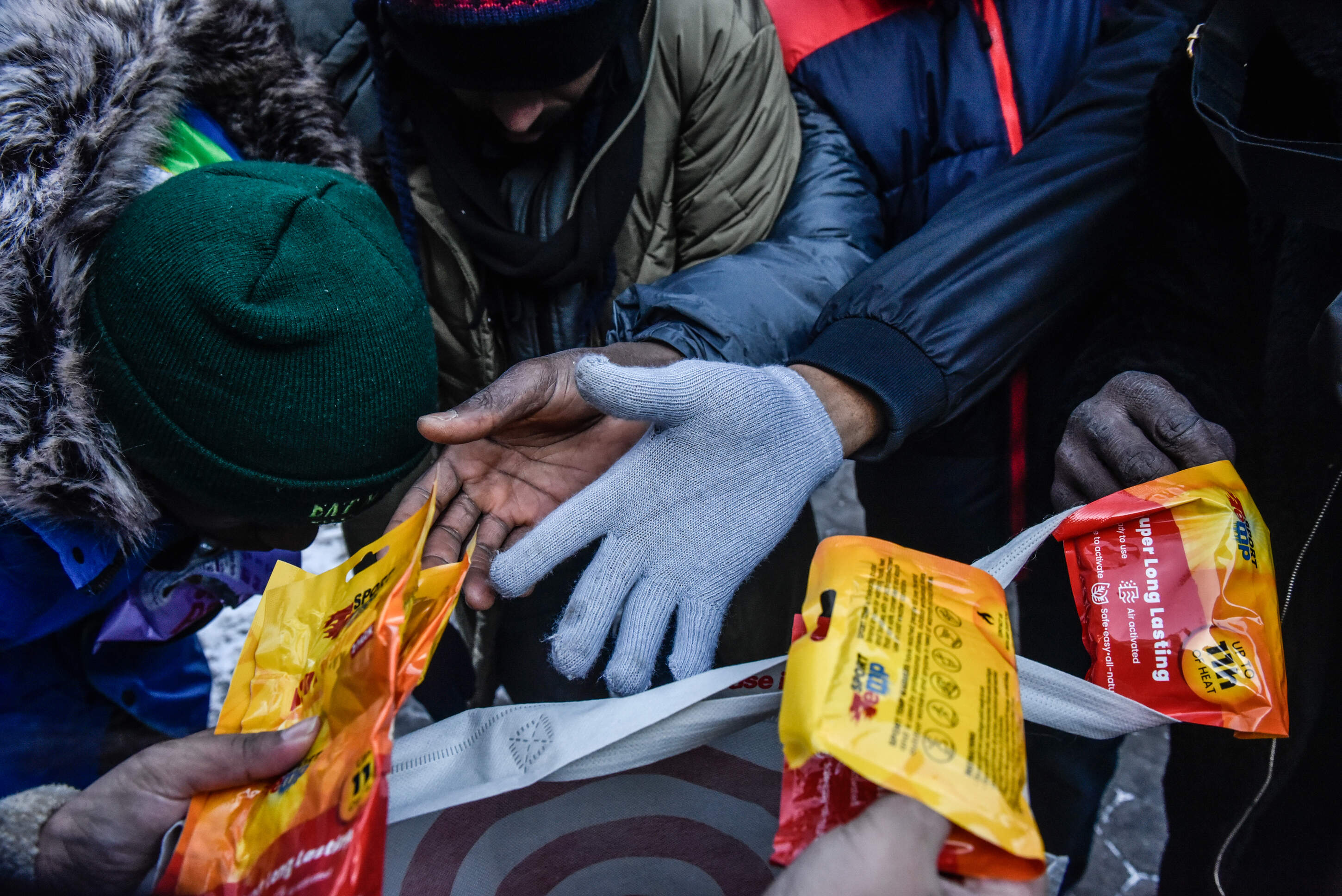 Homeless migrants receive food and clothing donations in Tompkins Square Park on January 20, 2024 in New York City. (Stephanie Keith/Getty Images)