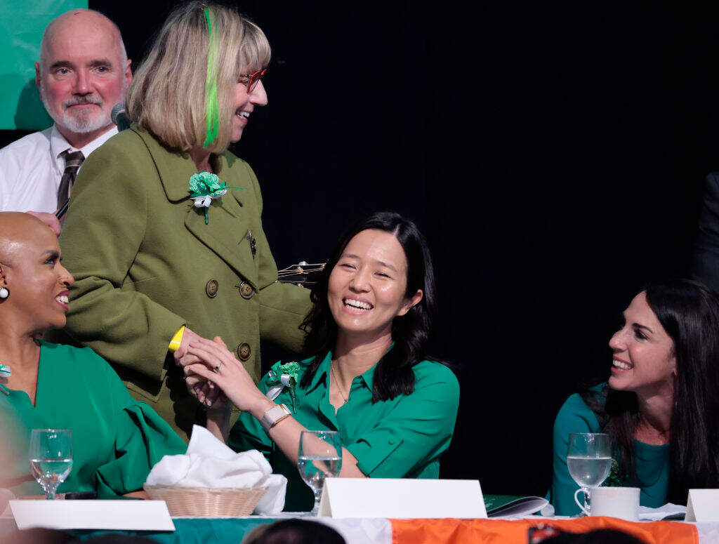 Senate President Karen E. Spilka greets Boston Mayor Michelle Wu at the annual St. Patrick's Day Breakfast in 2024. (Pat Greenhouse/The Boston Globe via Getty Images)