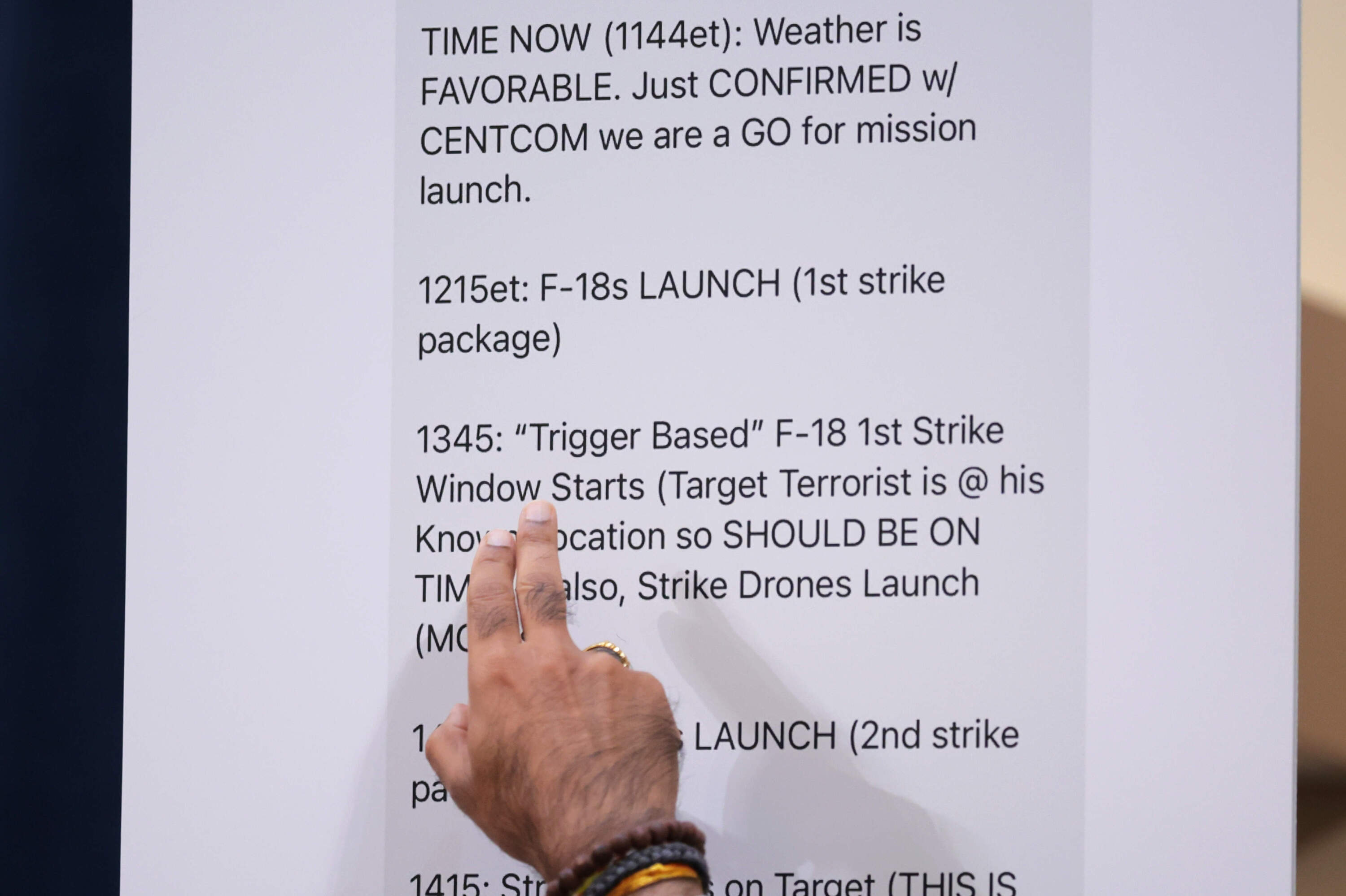 U.S. Rep. Raja Krishnamoorthi (D-IL) points to text messages by Defense Secretary Pete Hegseth during an annual worldwide threats assessment hearing at the Longworth House Office Building on March 26, 2025 in Washington, DC. The hearing held by the House Permanent Select Committee on Intelligence addressed top aides inadvertently including Jeffrey Goldberg, the editor-in-chief for The Atlantic magazine, on a high level Trump administration Signal group chat discussing plans to bomb Houthi targets in Yemen. (Kayla Bartkowski/Getty Images)