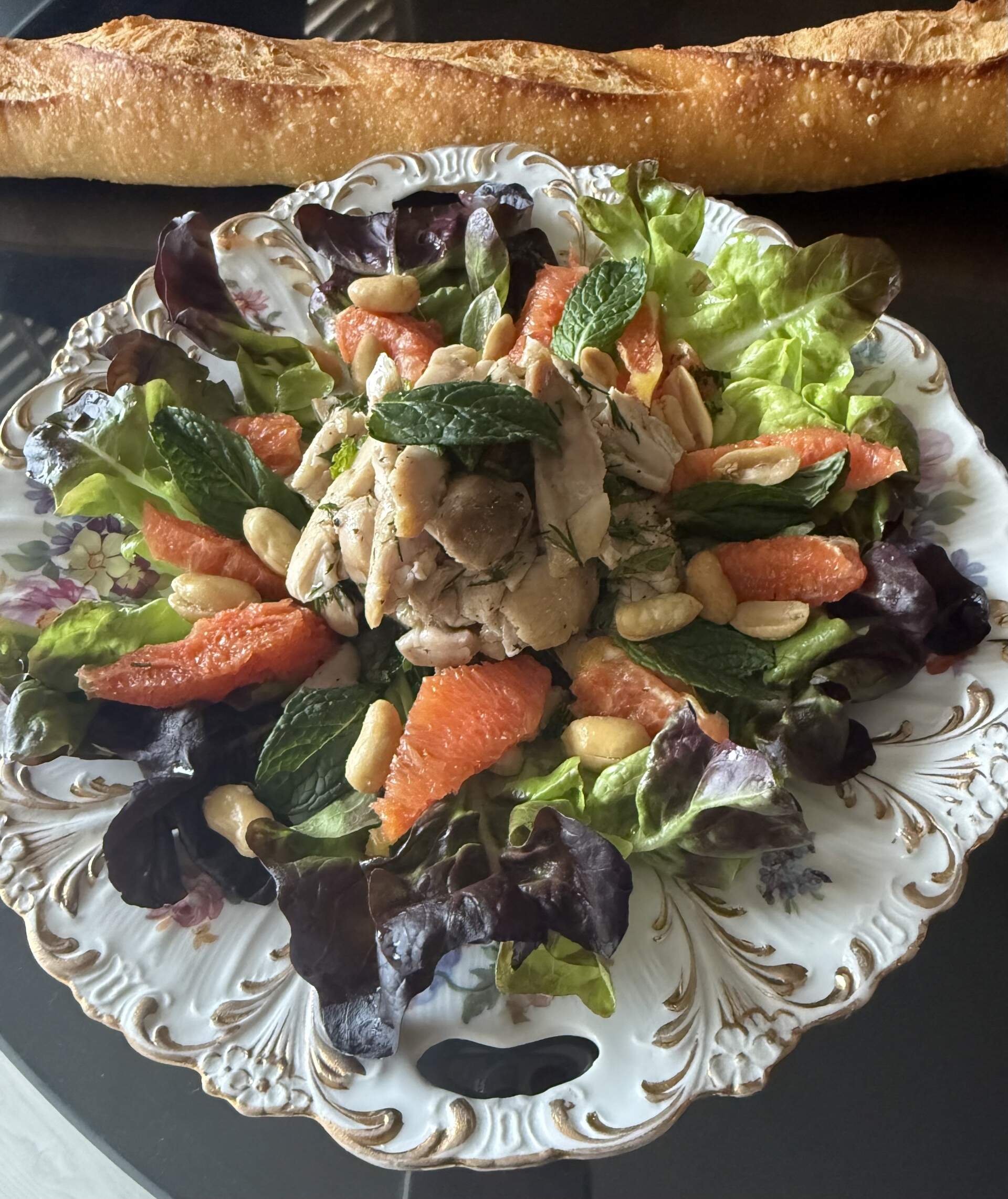 Spring chicken and orange salad with mint, dill and peanuts. (Kathy Gunst / here & amp; now)