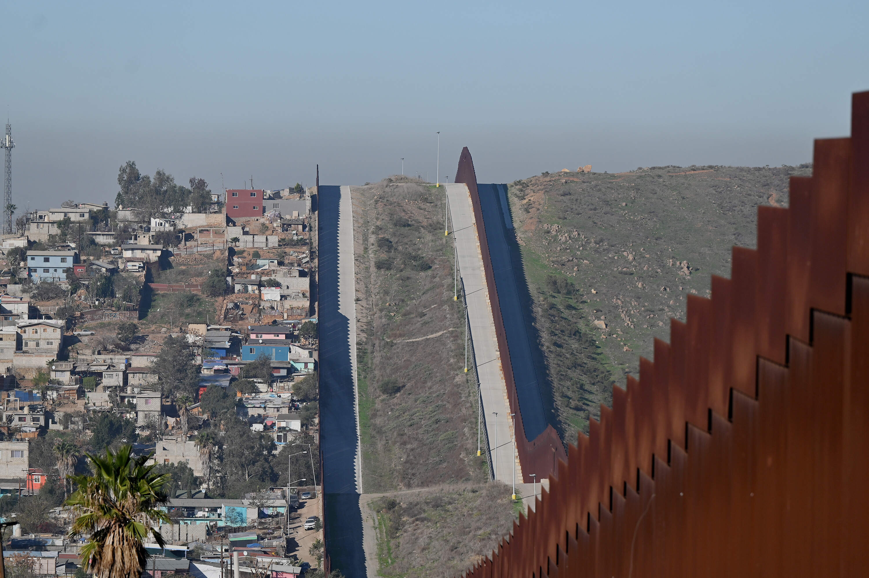 The U.S.-Mexico border fence is in eastern Tijuana, Baja California, Mexico, on Feb. 26. (Carlos Moreno/NurPhoto via Getty Images)
