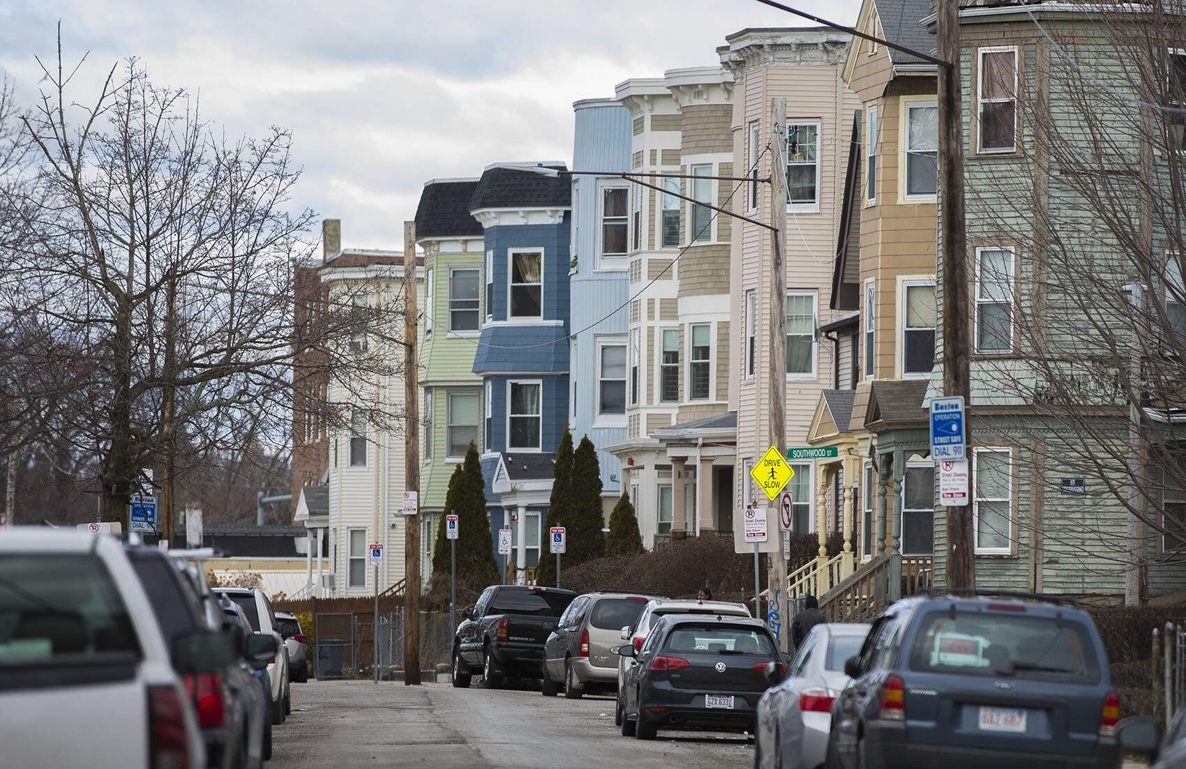 Triple-deckers along Edgewood Street in Dorchester. (Jesse Costa/WBUR)