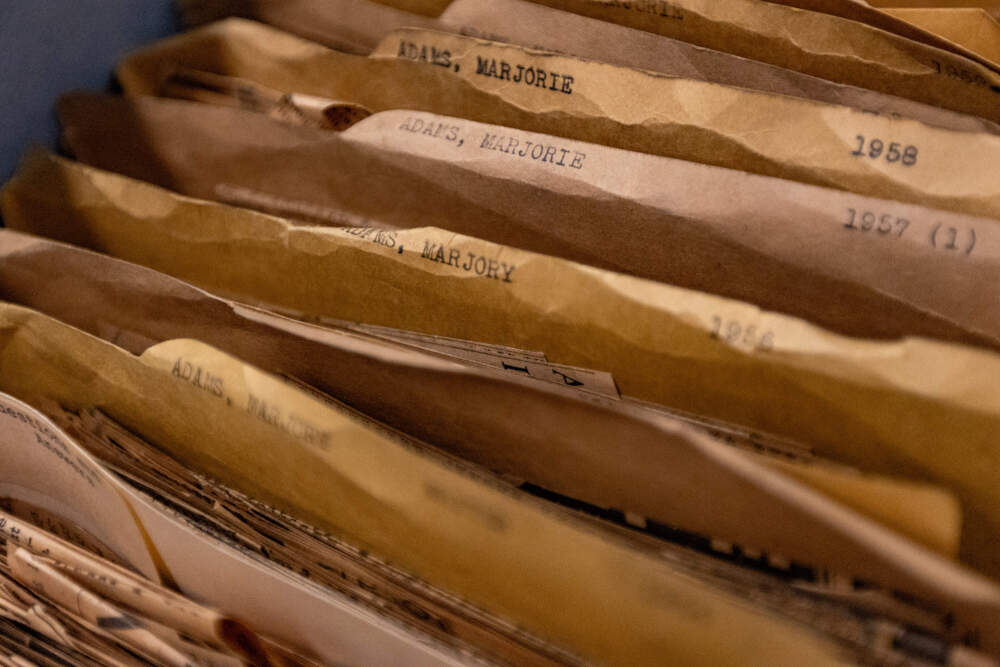 Folders of articles written by Boston Globe art critic Marjory Adams, organized by year, at the Snell Library at Northeastern University. (Jesse Costa/WBUR)