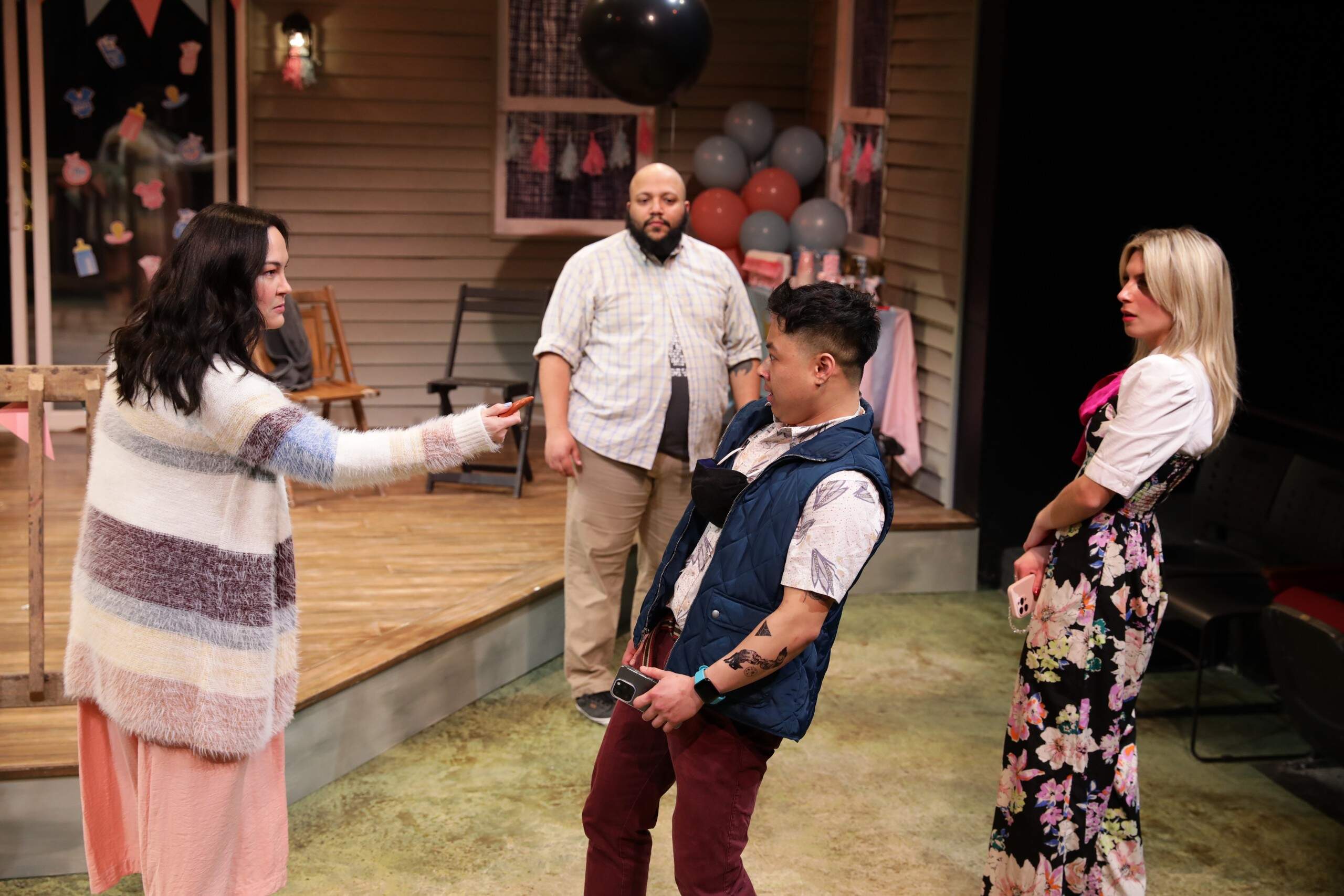 From left, Paige Clark, Arthur Gomez, Jupiter Lê and Antonia Turilli in Lyric Stage Company's production of "The Great Reveal." (Courtesy Mark S. Howard)