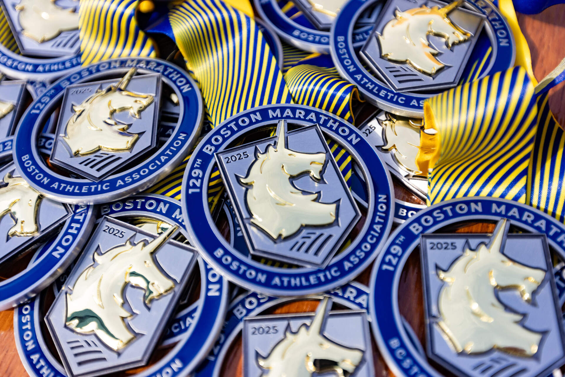 The new design on medals for the 129th Boston Marathon. (Jesse Costa/WBUR)