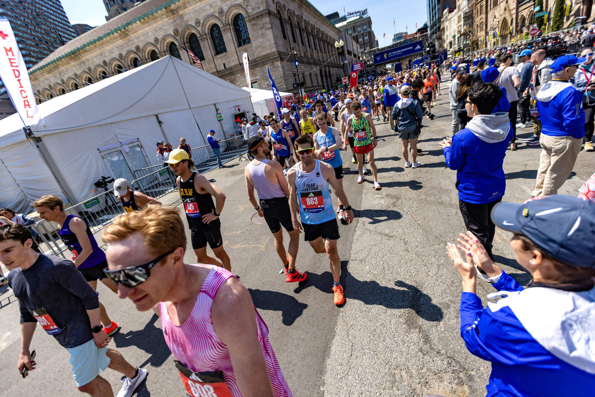 Boston Marathon runners after crossing the finish line. (Jesse Costa/WBUR)