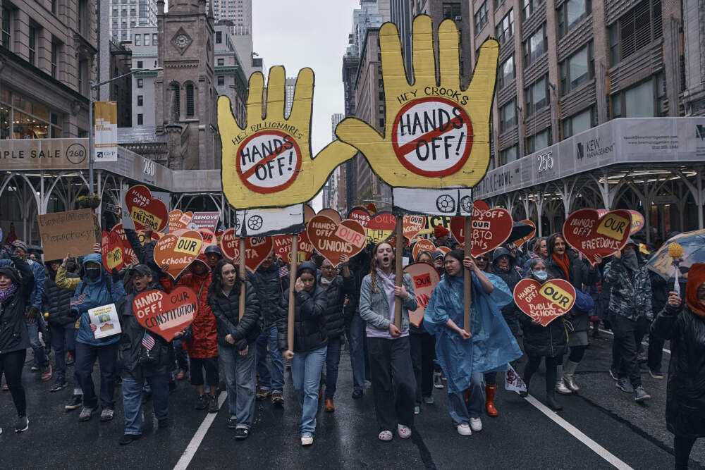 Protestors shout slogans as they march during a "Hands Off!" protest against President Donald Trump on Saturday, April 5, 2025, in New York. (Andres Kudacki/AP)