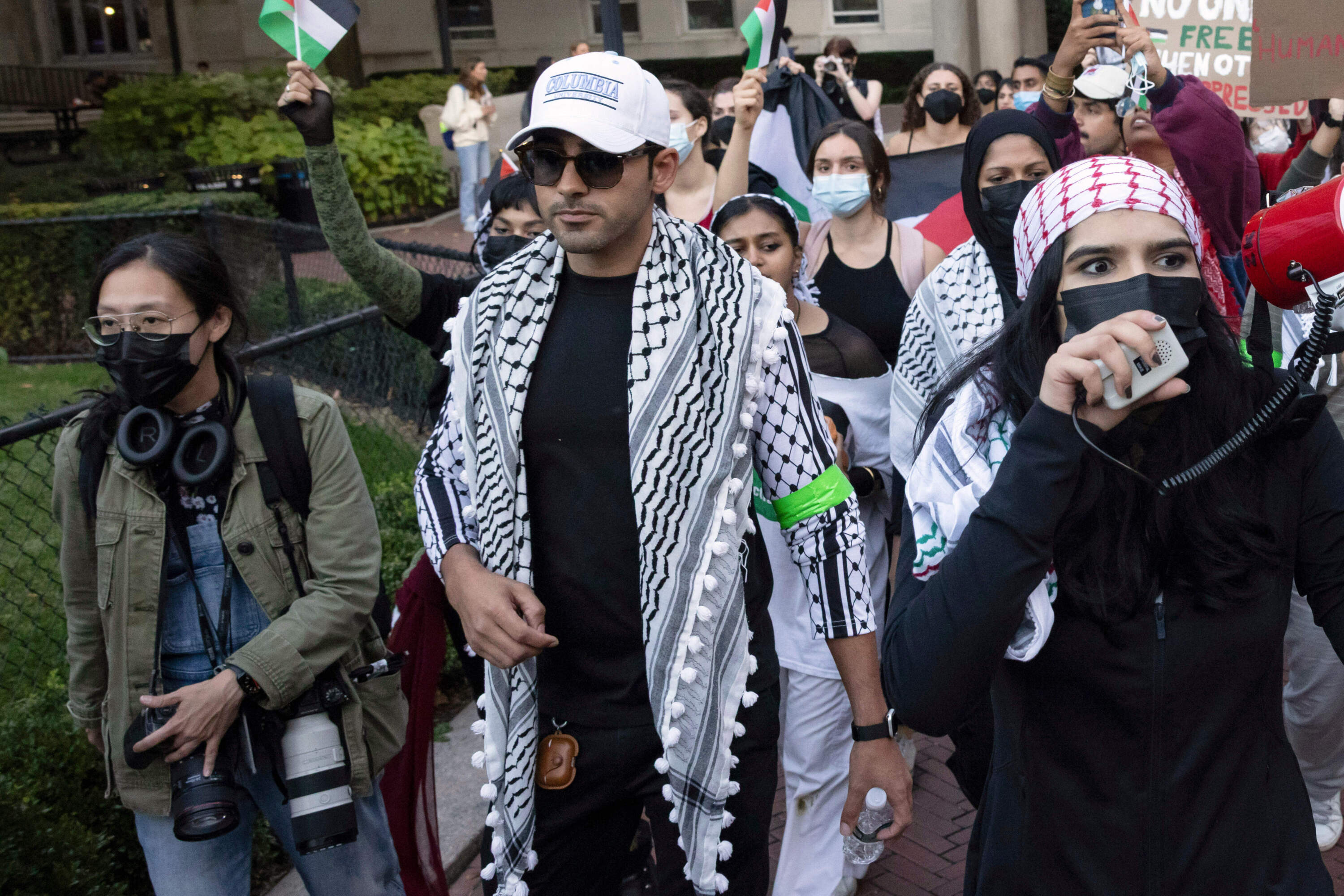 Mohsen Mahdawi, center, looks on during a pro-Palestinian protest at Columbia University on Oct. 12, 2023, in New York. (Yuki Iwamura/AP)