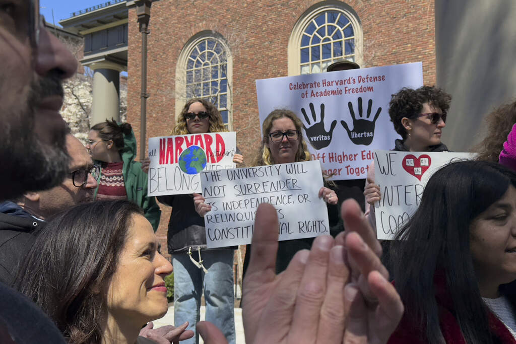 Students, faculty and members of the Harvard University community rally on Thursday after news of the Trump administration's funding cuts and demands for international student records. (AP)