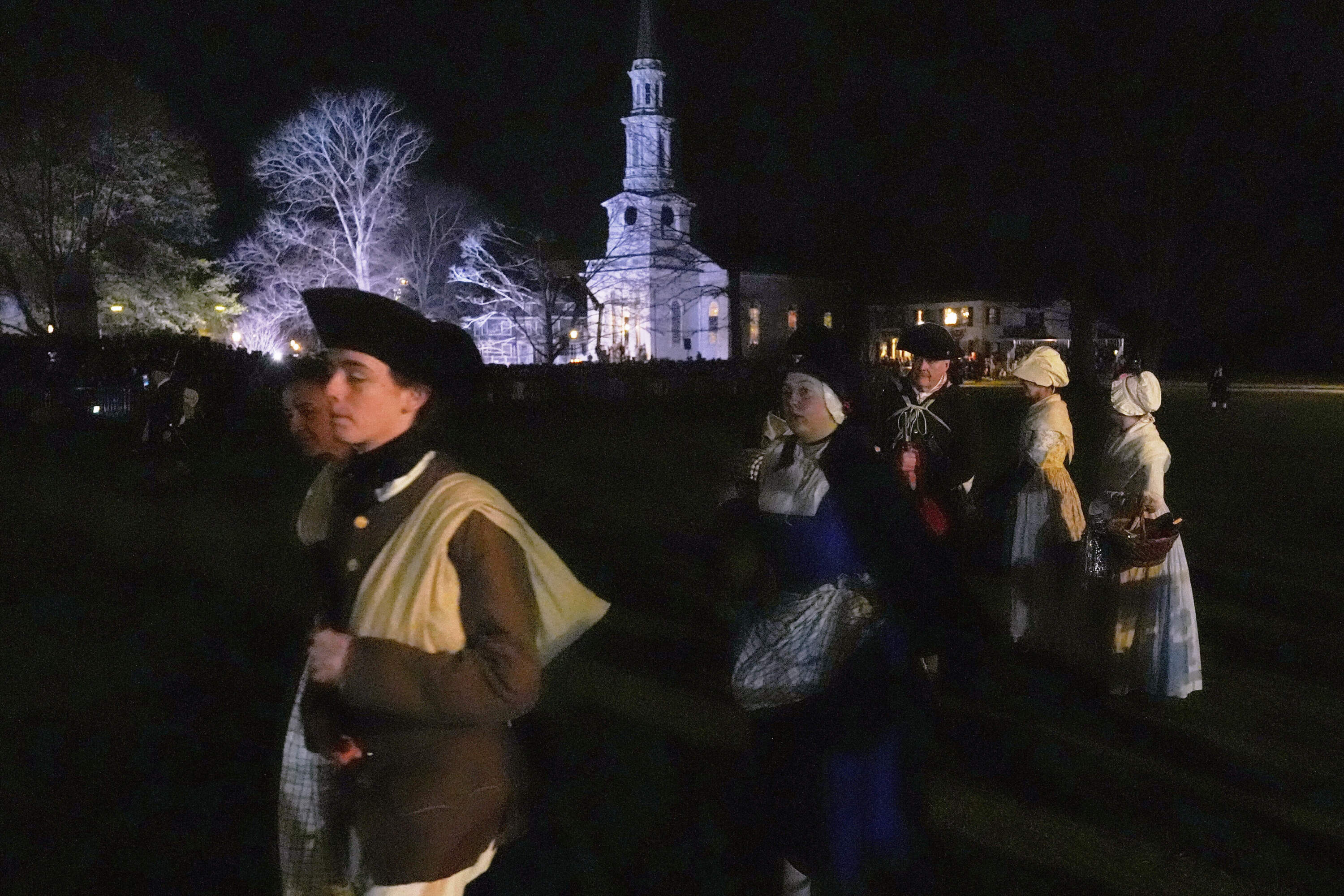 Colonials gather prior to facing the British Regulars. (Charles Krupa/AP)