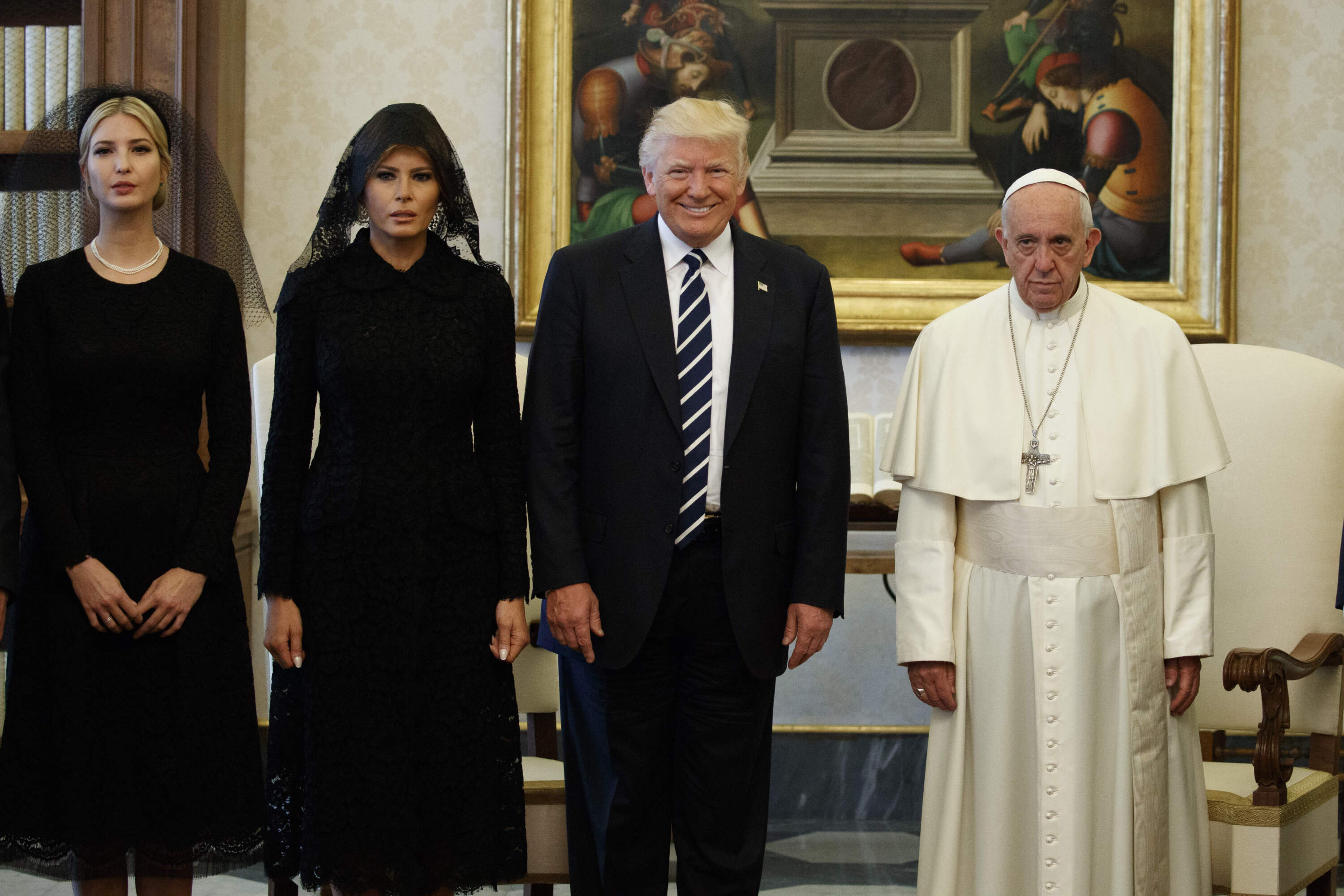 Ivanka Trump, first lady Melania Trump, and President Donald Trump stand with Pope Francis during a meeting in 2017, at the Vatican. Evan Vucci/AP file photo)
