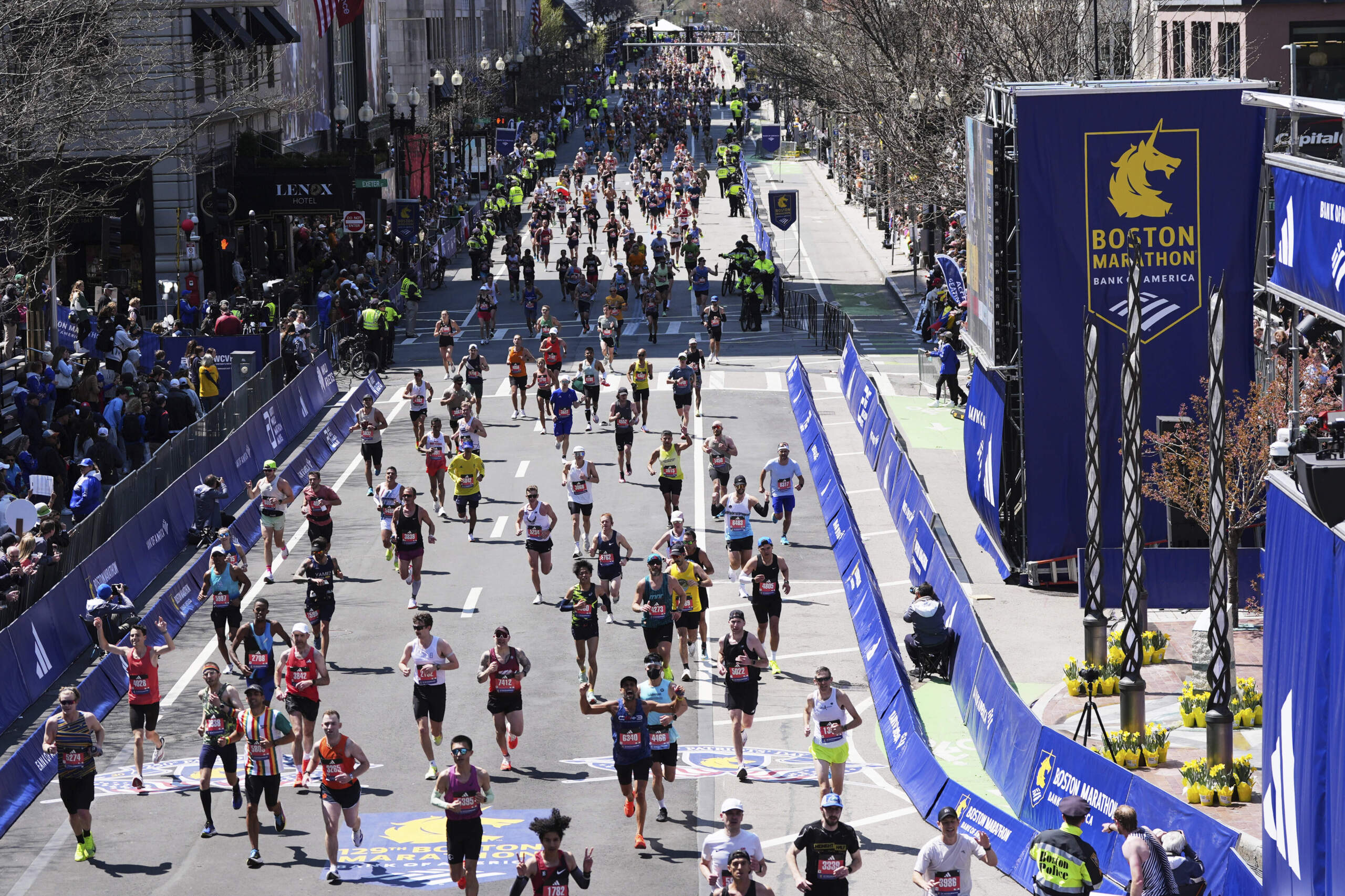 Runners approach the finish line during the 2025 Boston Marathon.