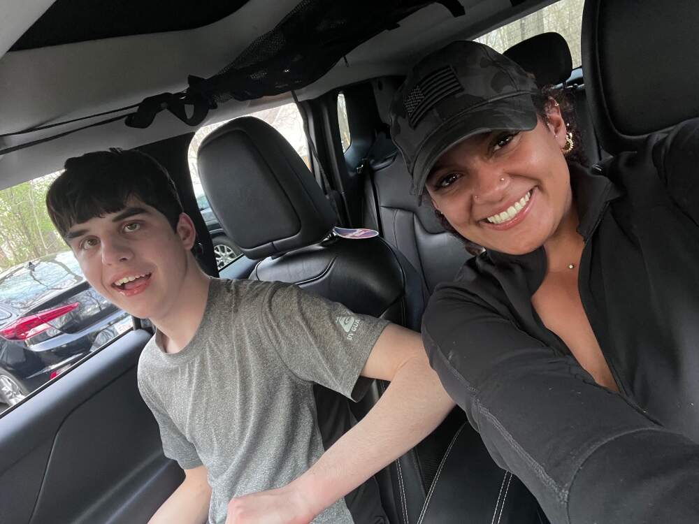The author's son, Finn, with his former teacher, and best friend, who drove from North Carolina to Boston to see him, on Easter weekend, 2025. (Courtesy Alysia Abbott)