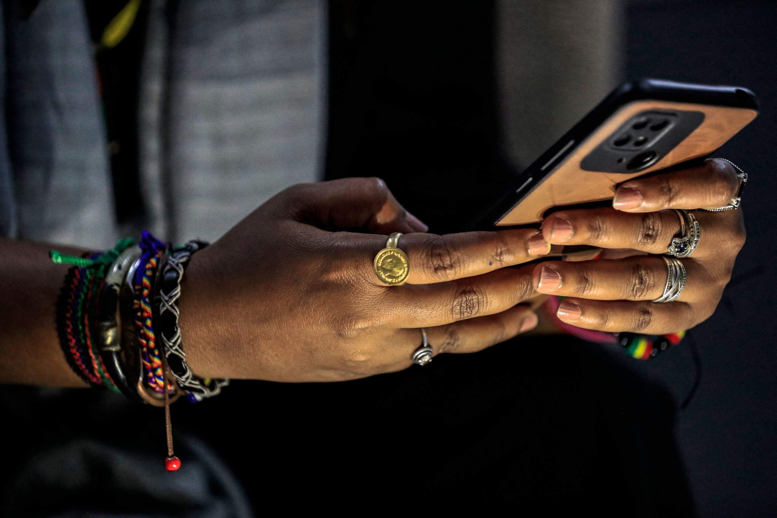 A woman uses a phone. (Ashraf Shazly/AFP via Getty Images)
