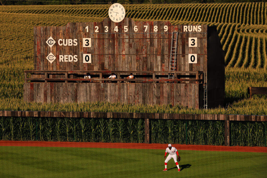 Aristides Aquino #44 of the Cincinnati Reds looks on during the second inning against the Chicago Cubs at Field of Dreams on August 11, 2022 in Dyersville, Iowa. (Michael Reaves/Getty Images)
